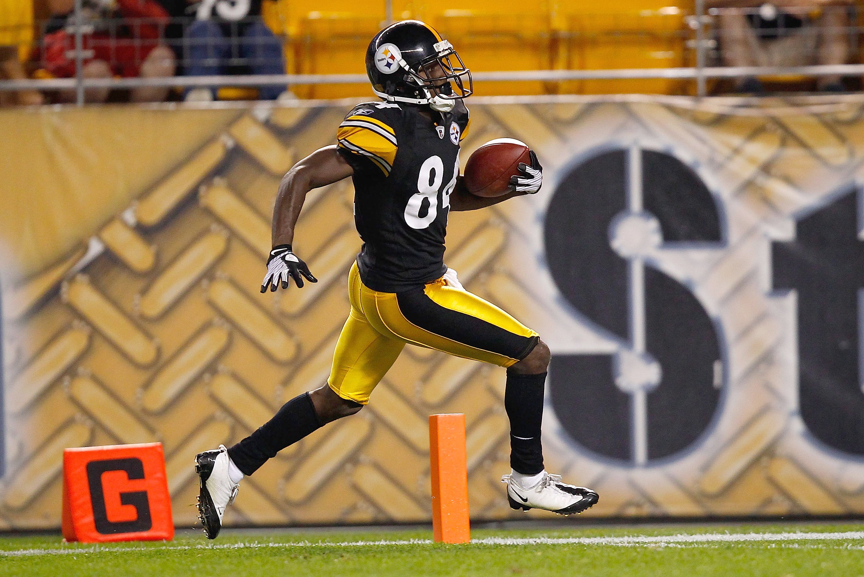 PITTSBURGH - AUGUST 14: Antonio Brown #84 of the Pittsburgh Steelers crosses the goal line on a 64 yard touchdown catch against the Detroit Lions during the preseason game on August 14, 2010 at Heinz Field in Pittsburgh, Pennsylvania. (Photo by Jared Wick