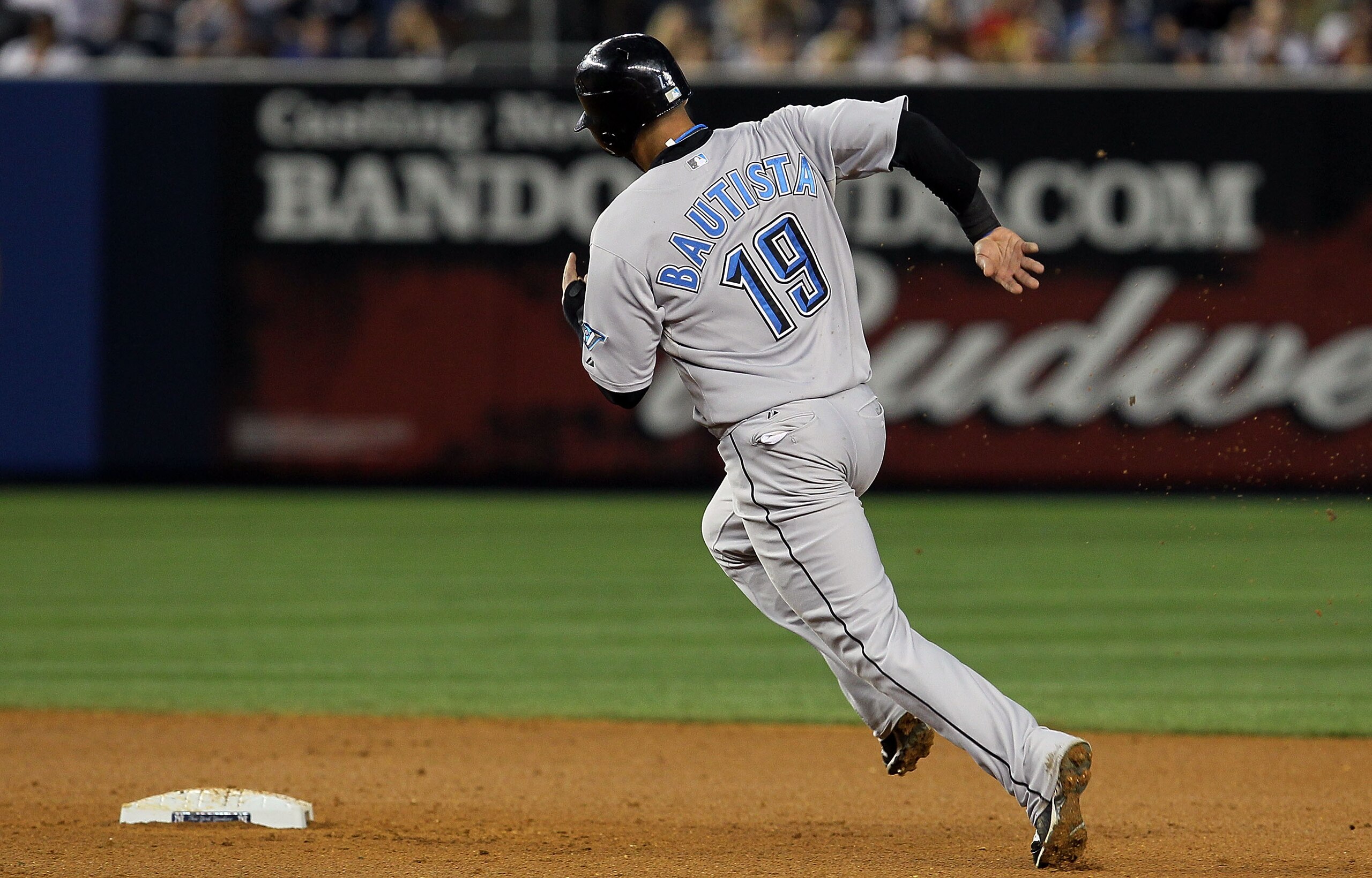 NEW YORK - AUGUST 03:  Jose Bautista #19 of the Toronto Blue Jays runs against of the New York Yankees on August 3, 2010 at Yankee Stadium in the Bronx borough of New York City. The Jays defeated the Yankees 8-2.  (Photo by Jim McIsaac/Getty Images)
