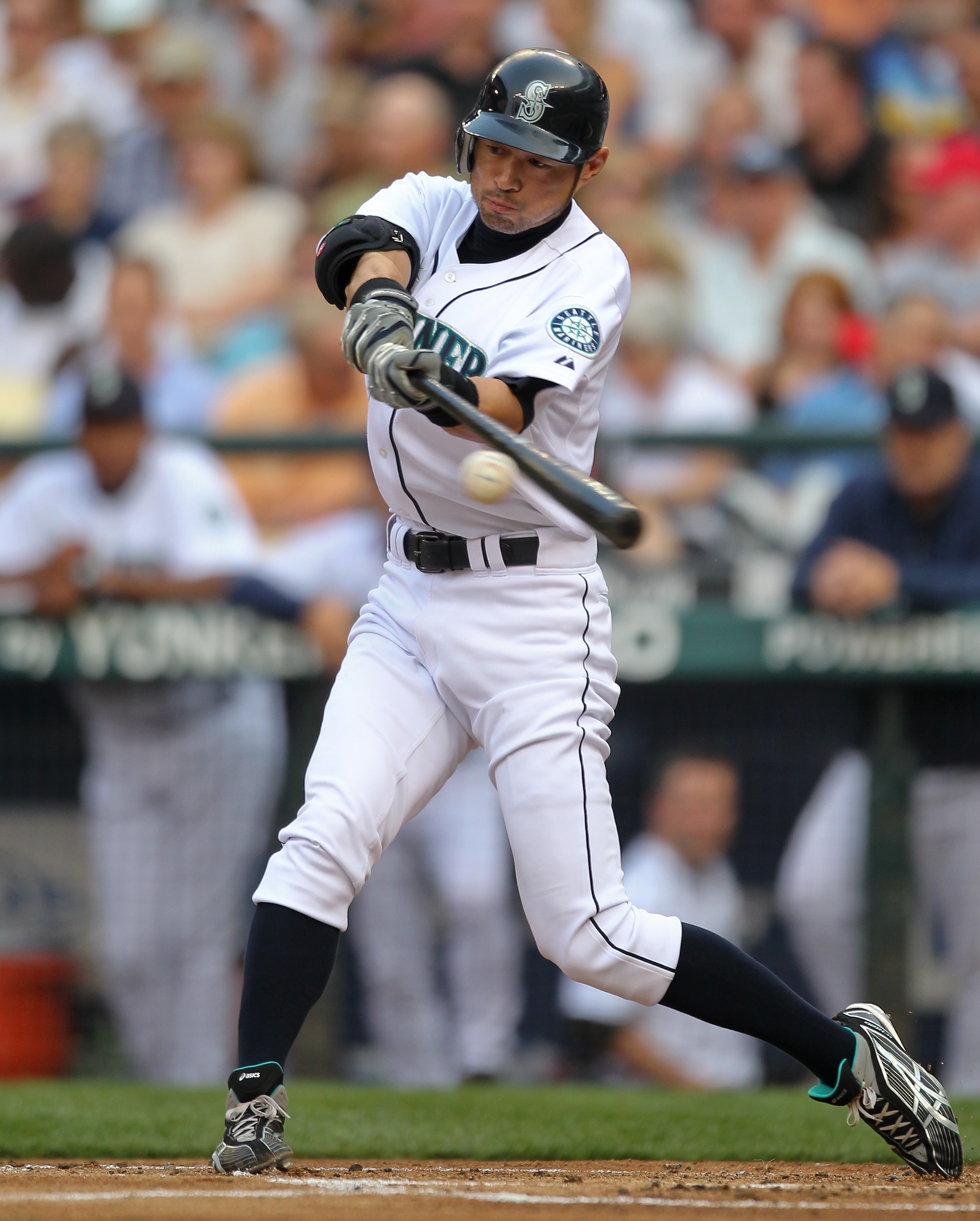 SEATTLE - AUGUST 05:  Ichiro Suzuki #51 of the Seattle Mariners doubles against the Texas Rangers at Safeco Field on August 5, 2010 in Seattle, Washington. (Photo by Otto Greule Jr/Getty Images)