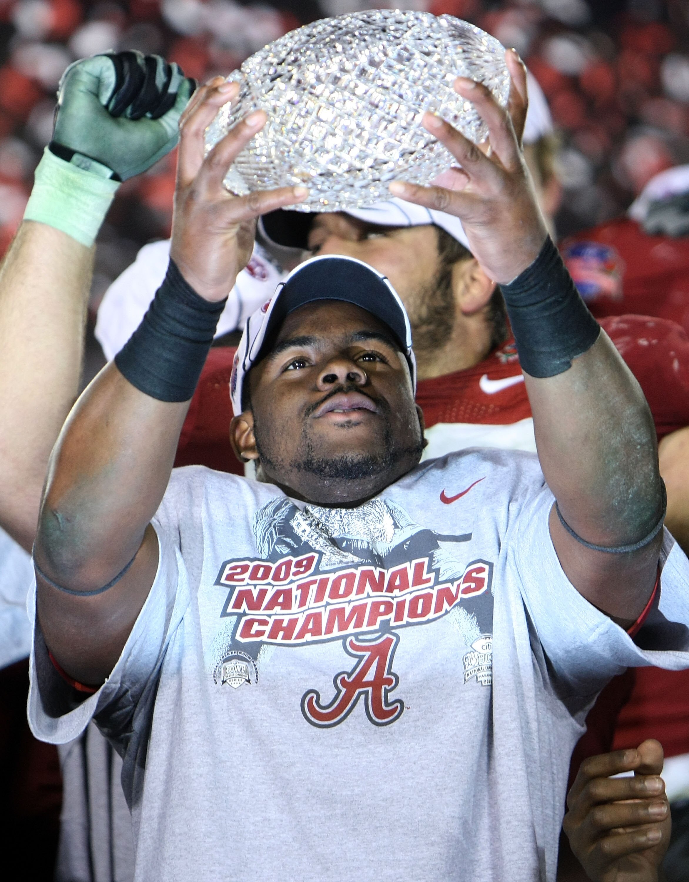 PASADENA, CA - JANUARY 07:  Running back Mark Ingram #22 of the Alabama Crimson Tide celebrates with the BCS Championship trophy after winning the Citi BCS National Championship game over the Texas Longhorns at the Rose Bowl on January 7, 2010 in Pasadena