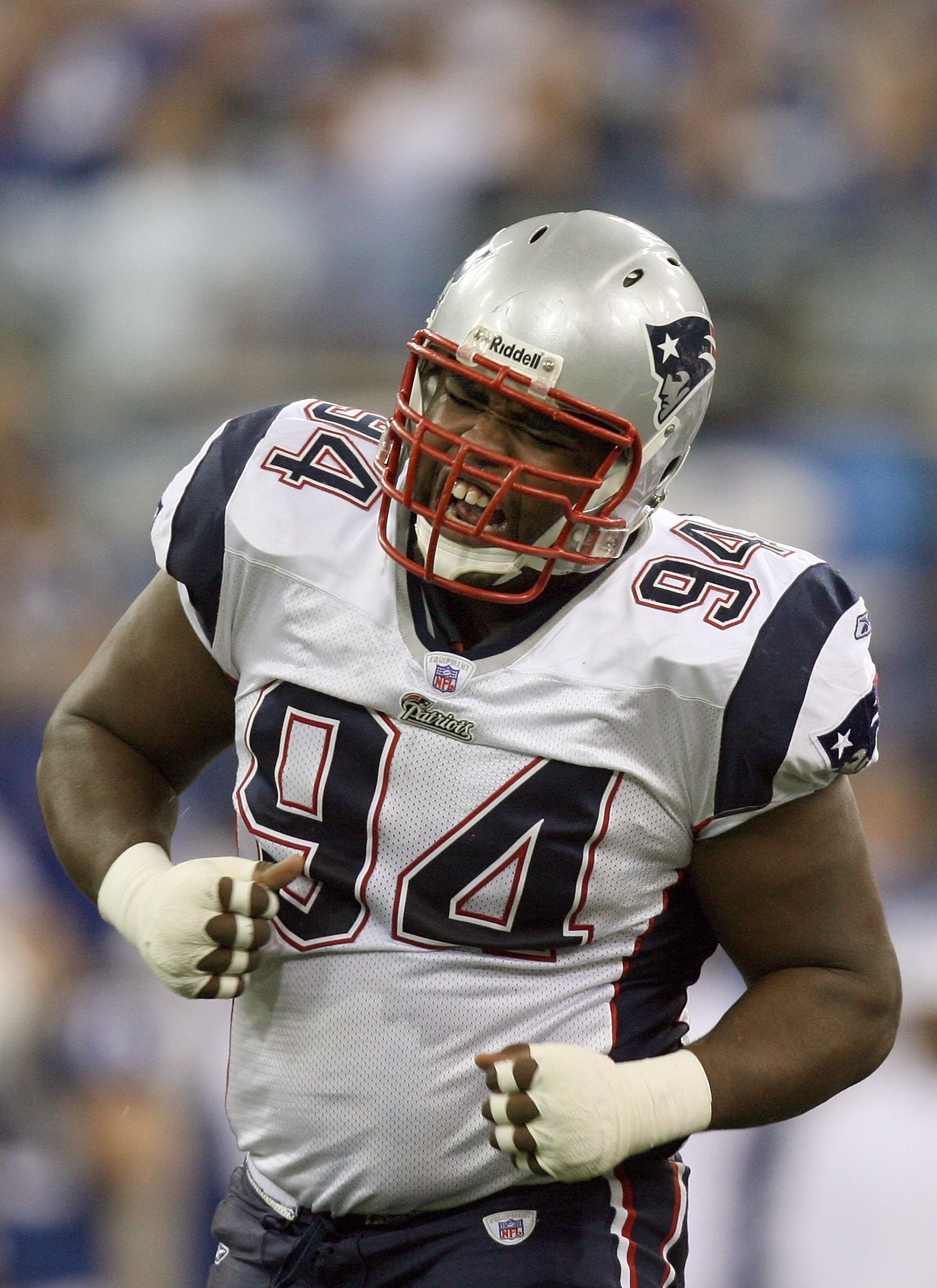 INDIANAPOLIS - JANUARY 21:  Ty Warren #94 of the New England Patriots celebrates after a play against the Indianapolis Colts during the AFC Championship Game on January 21, 2007 at the RCA Dome in Indianapolis, Indiana.  (Photo by Doug Benc/Getty Images)