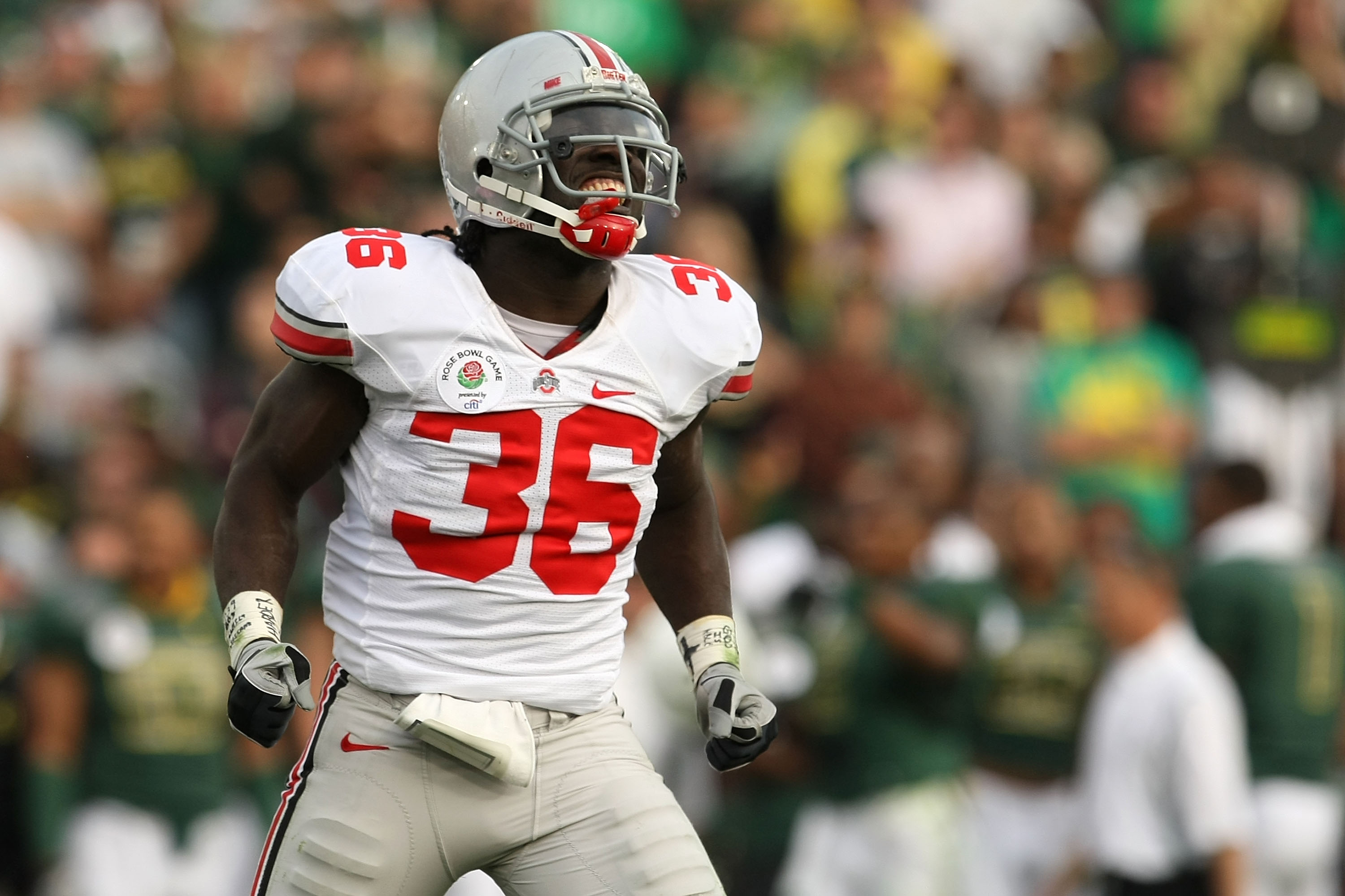 PASADENA, CA - JANUARY 01:  Linebacker Brian Rolle #36 of the Ohio State Buckeyes reacts to a play against the Oregon Ducks in the 96th Rose Bowl game on January 1, 2010 in Pasadena, California.  (Photo by Stephen Dunn/Getty Images)