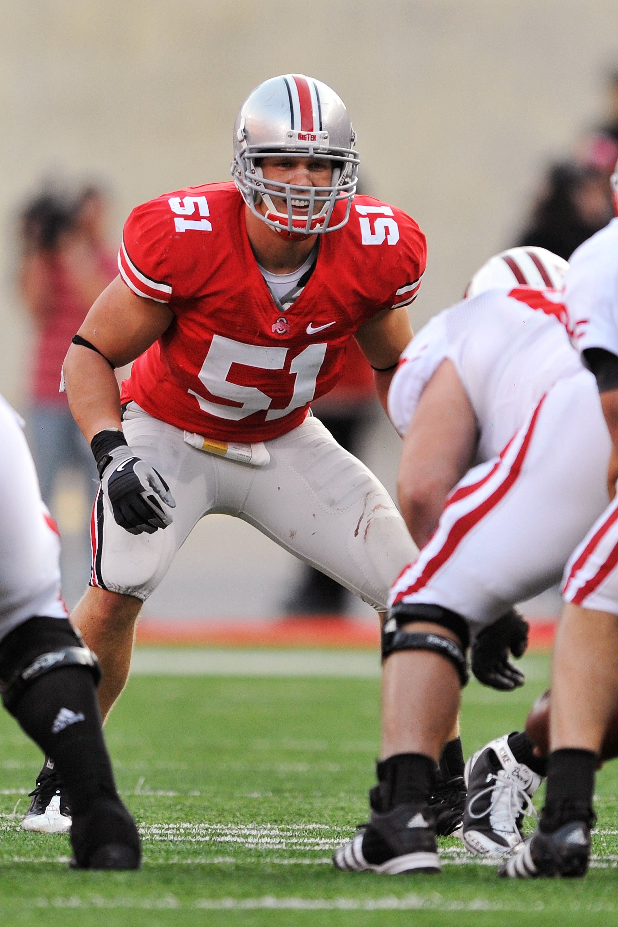COLUMBUS, OH - OCTOBER 10:  Linebacker Ross Homan #51 of the Ohio State Buckeyes waits for the snap against the Wisconsin Badgers at Ohio Stadium on October 10, 2009 in Columbus, Ohio.  (Photo by Jamie Sabau/Getty Images)
