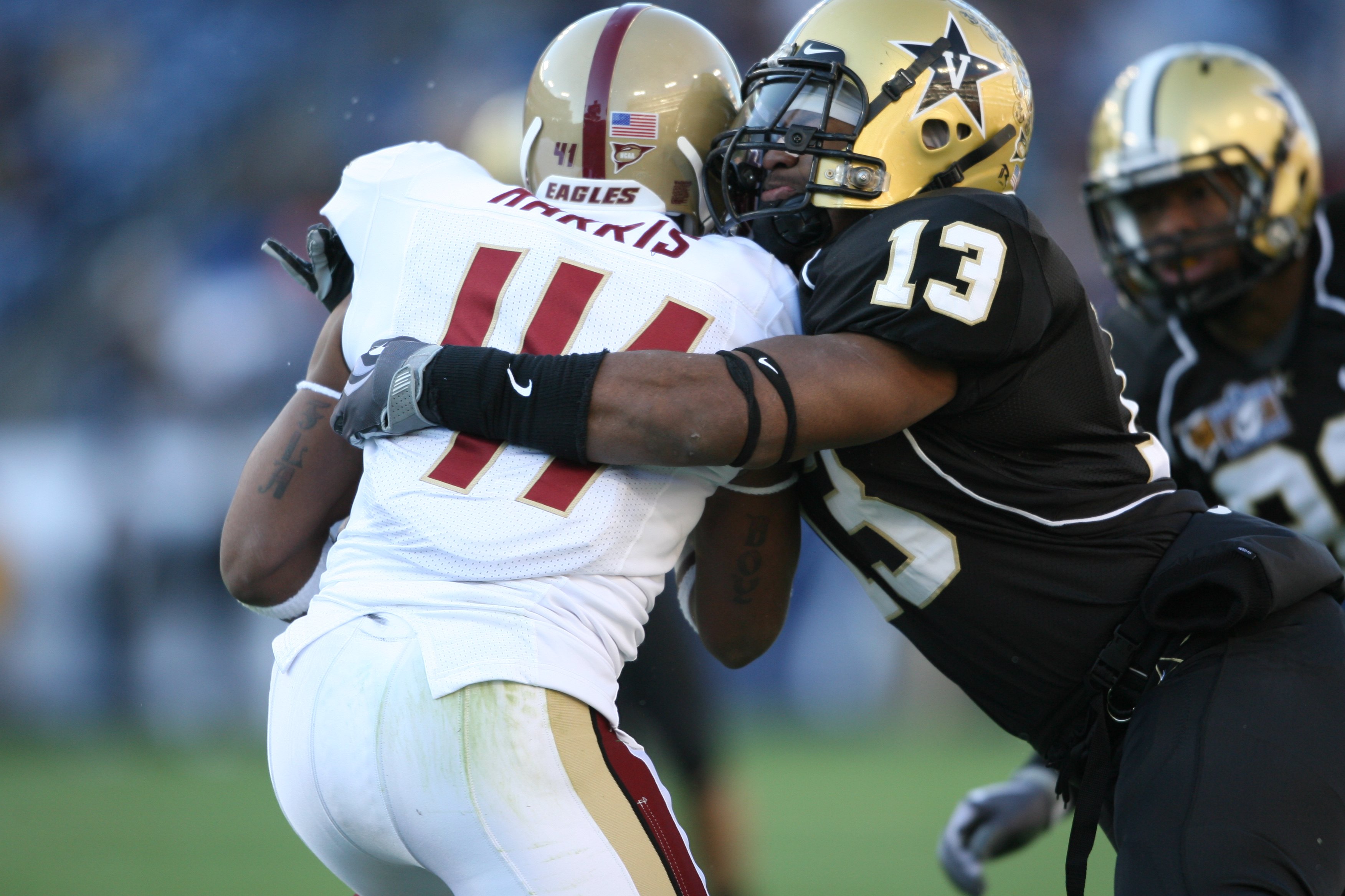 NASHVILLE, TN - DECEMBER 31:  Chris Marve #13 of the Vanderbilt Commodores tackles Montel Harris #41 of the Boston College Eagles during the Gaylord Hotels Music City Bowl at LP Field on December 31, 2008 in Nashville, Tennessee.  (Photo by Andy Lyons/Get