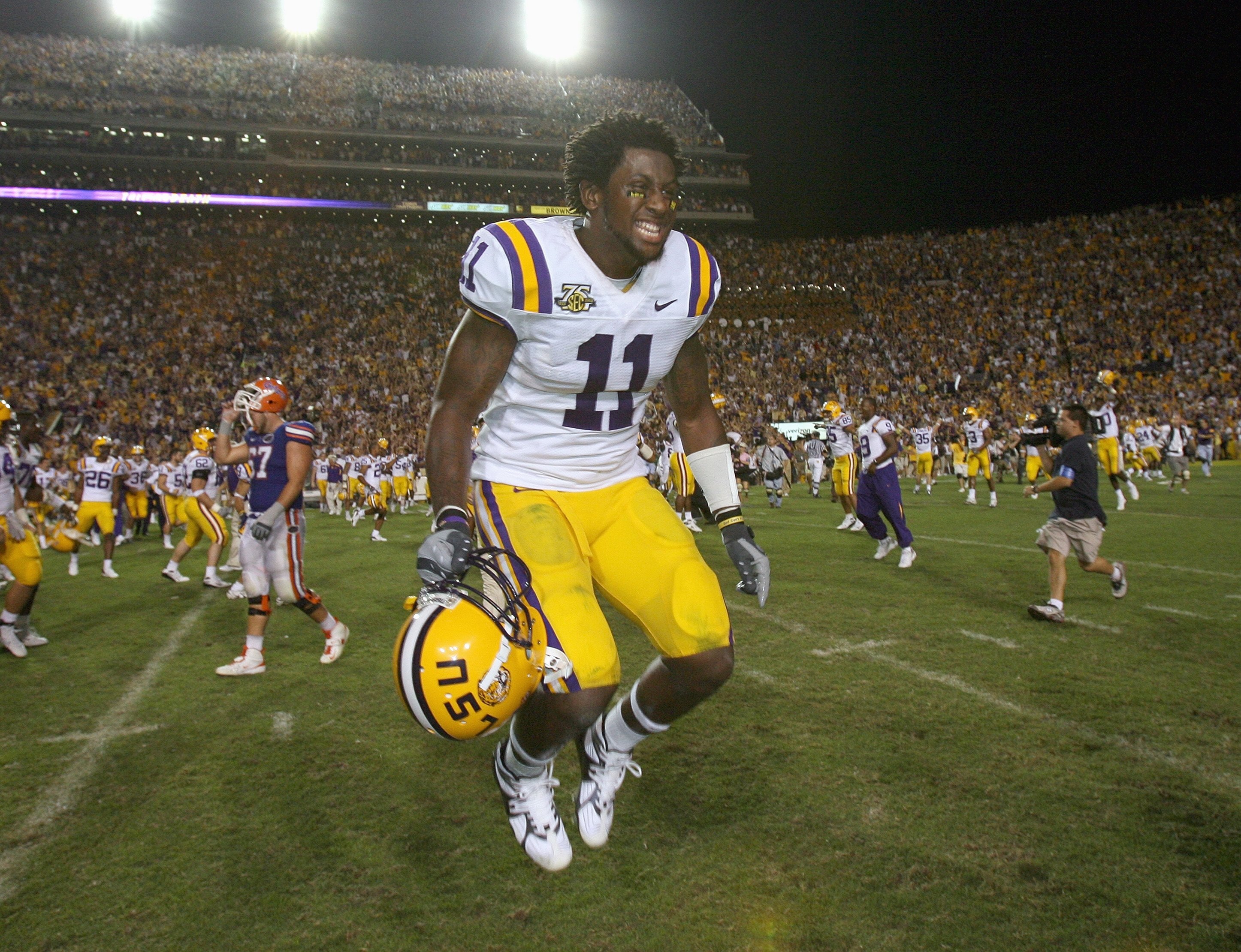 BATON ROUGE, LA - OCTOBER 06: Kelvin Sheppard #11 of the LSU Tigers celebrates on the field against the Florida Gators at Tiger Stadium on October 6 , 2007 in Baton Rouge, Louisiana. LSU defeated Florida 28-24. (Photo by Doug Benc/Getty Images)