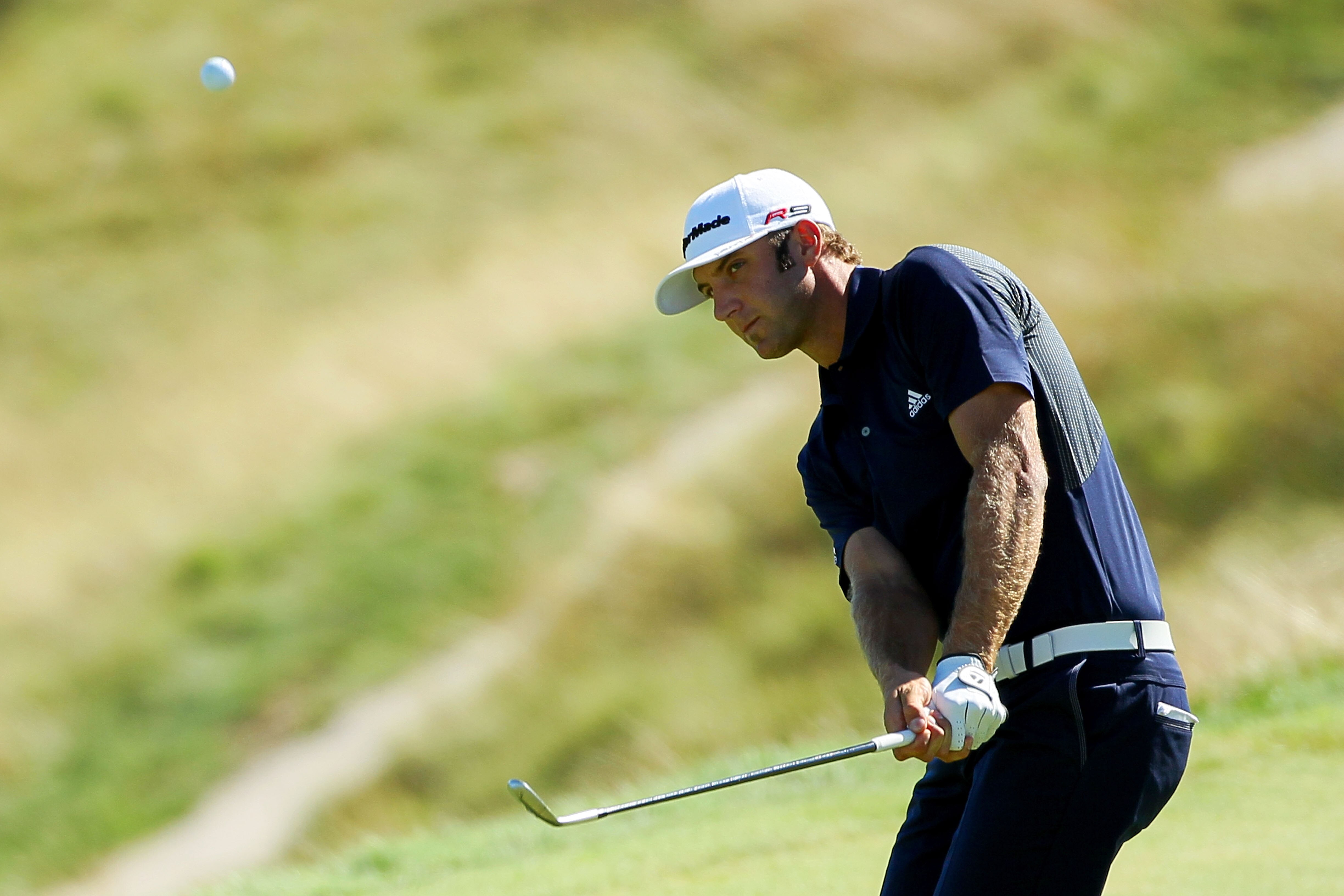 KOHLER, WI - AUGUST 15:  Dustin Johnson plays a pitch shot on the seventh hole during the final round of the 92nd PGA Championship on the Straits Course at Whistling Straits on August 15, 2010 in Kohler, Wisconsin.  (Photo by Andy Lyons/Getty Images)