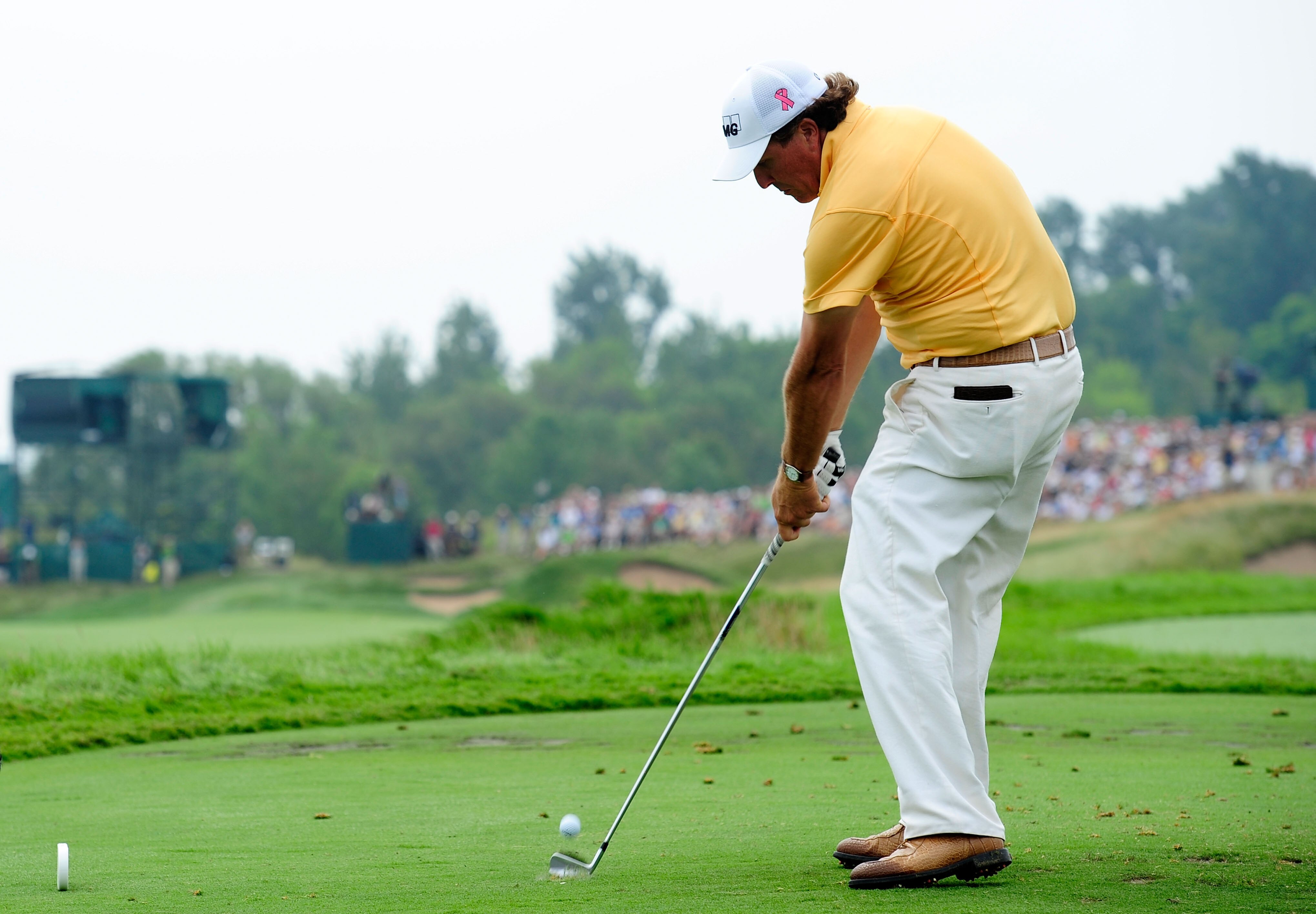 KOHLER, WI - AUGUST 13:  Phil Mickelson hits his tee shot on the 17th hole during the continuation of the first round of the 92nd PGA Championship on the Straits Course at Whistling Straits on August 13, 2010 in Kohler, Wisconsin.  (Photo by Stuart Frankl