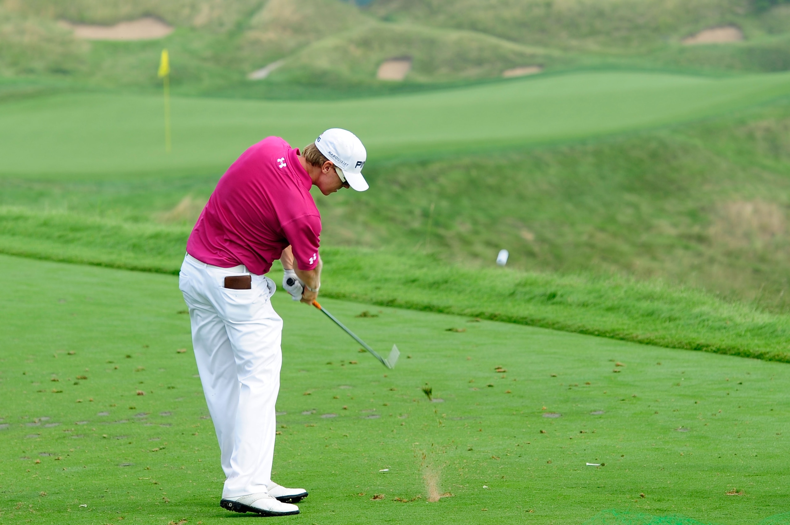 KOHLER, WI - AUGUST 10:  Hunter Mahan hits a shot during a practice round prior to the start of the 92nd PGA Championship on the Straits Course at Whistling Straits on August 10, 2010 in Kohler, Wisconsin.  (Photo by Stuart Franklin/Getty Images)