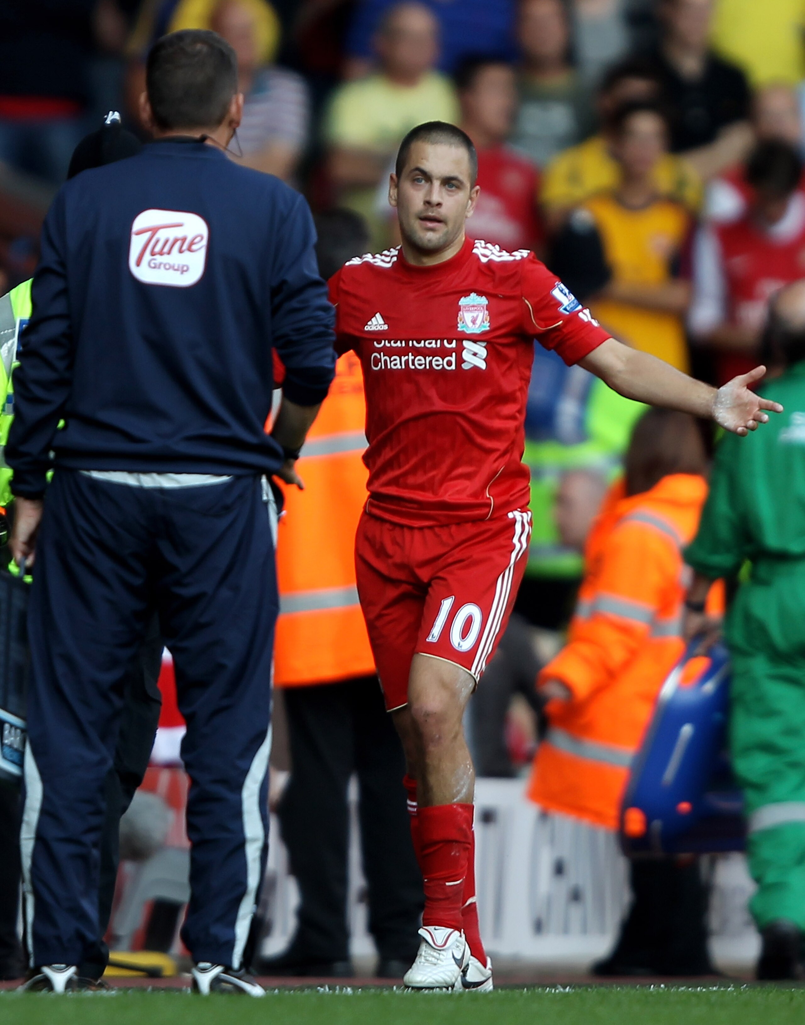 LIVERPOOL, ENGLAND - AUGUST 15:  Joe Cole of Liverpool reacts after being sent off during the Barclays Premier League match between Liverpool and Arsenal at Anfield on August 15, 2010 in Liverpool, England. (Photo by Clive Brunskill/Getty Images)
