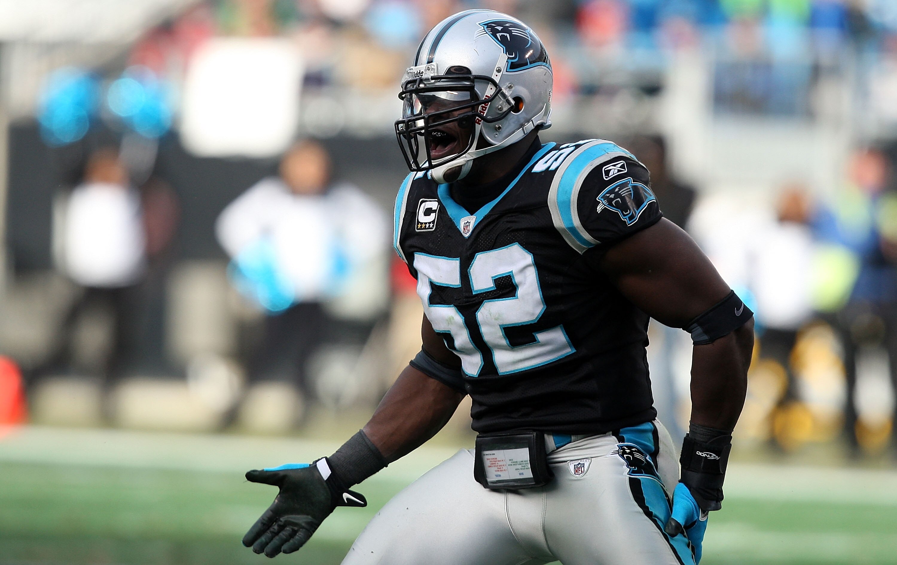 CHARLOTTE, NC - JANUARY 03:  Jon Beason #52 of the Carolina Panthers celebrates after tackle against the New Orleans Saints during their game at Bank of America Stadium on January 3, 2010 in Charlotte, North Carolina.  (Photo by Streeter Lecka/Getty Image