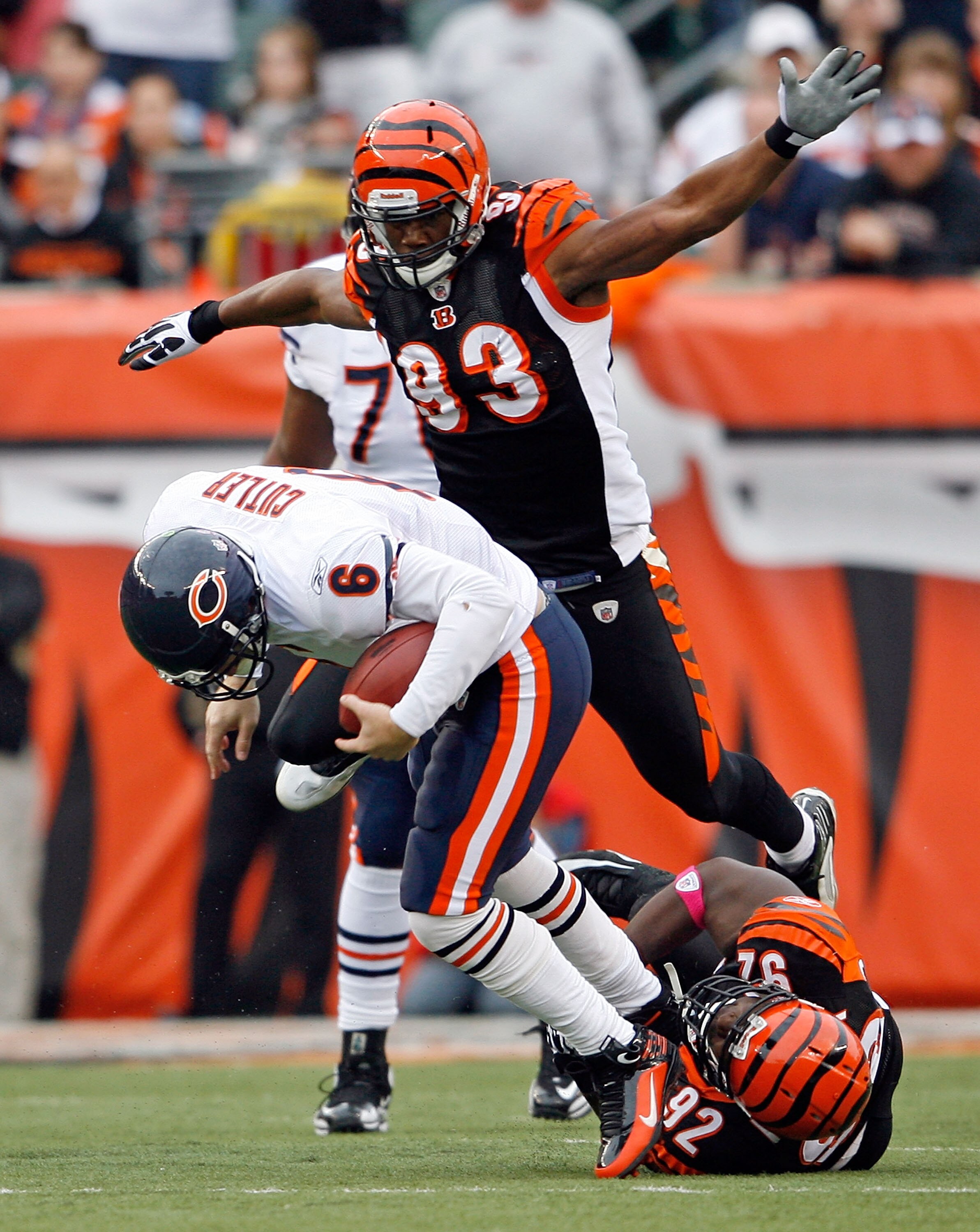 CINCINNATI - OCTOBER 25:  Jay Cutler #6 of the Chicago Bears is sacked by Michael Johnson #93 and Frostee Rucker #92 of the Cincinnati Bengals at Paul Brown Stadium on October 25, 2009 in Cincinnati, Ohio. The Bengals won 45-10.  (Photo by Andy Lyons/Gett