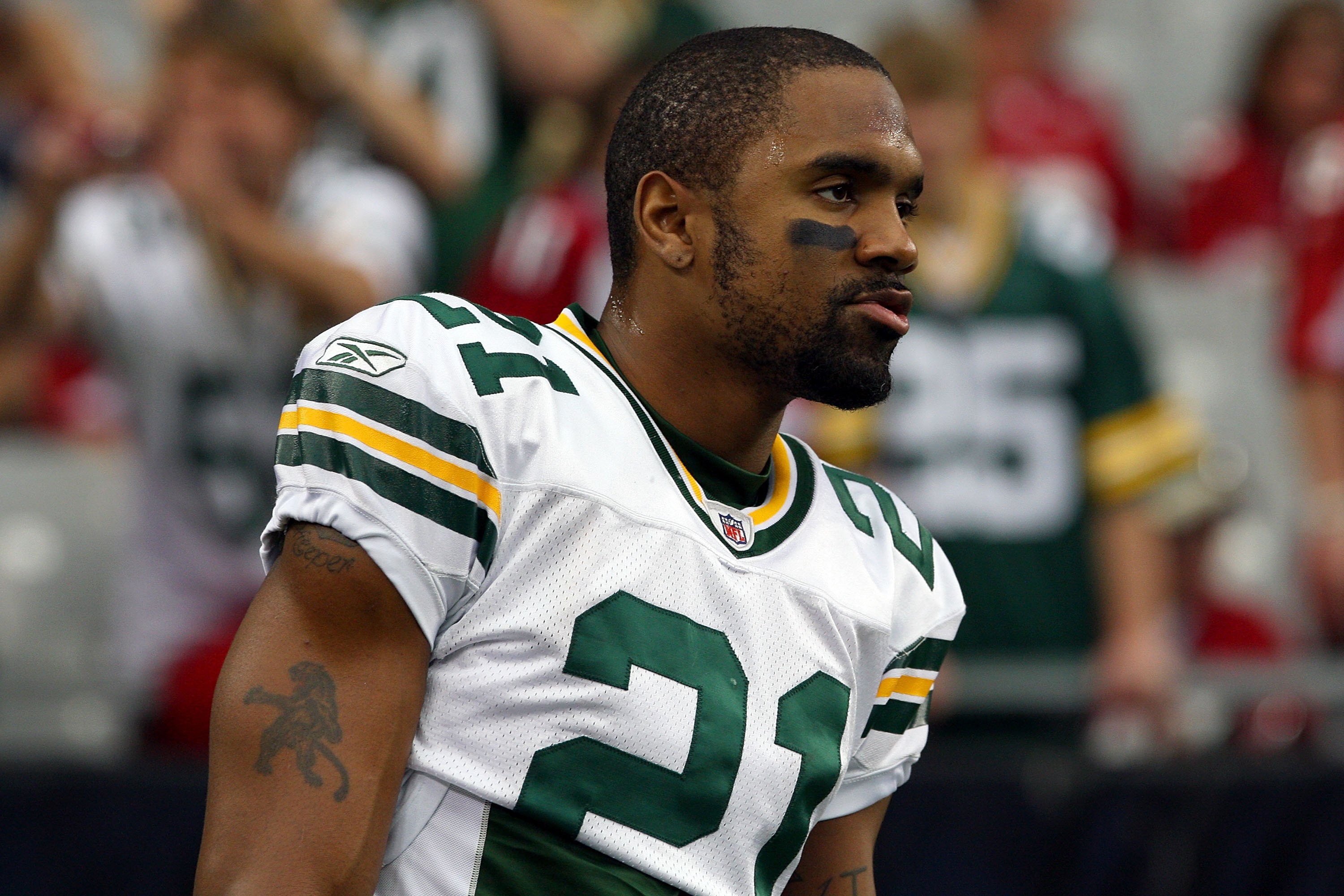 GLENDALE, AZ - JANUARY 03:  Charles Woodson #21 of the Green Bay Packers looks on against the Arizona Cardinals at University of Phoenix Stadium on January 3, 2010 in Glendale, Arizona.  (Photo by Maxx Wolfson/Getty Images)
