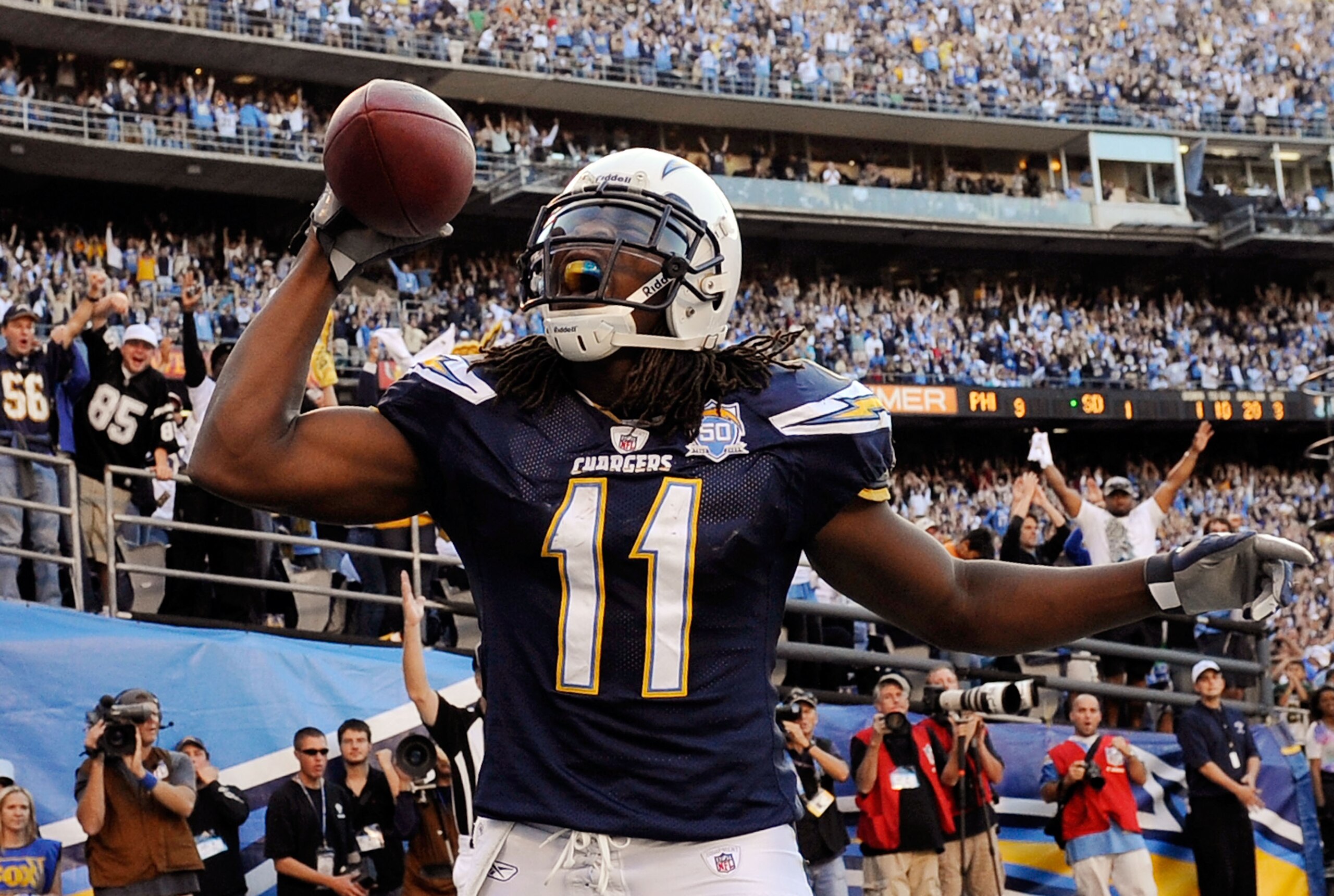 SAN DIEGO - NOVEMBER 15:  Legendu Naanee #11 of the San Diego Chargers celebrates after a scoring a touchdown against the Philadelphia Eagles of the Philadelphia Eagles during the NFL football game at Qualcomm Stadium on November 15, 2009 in San Diego, Ca