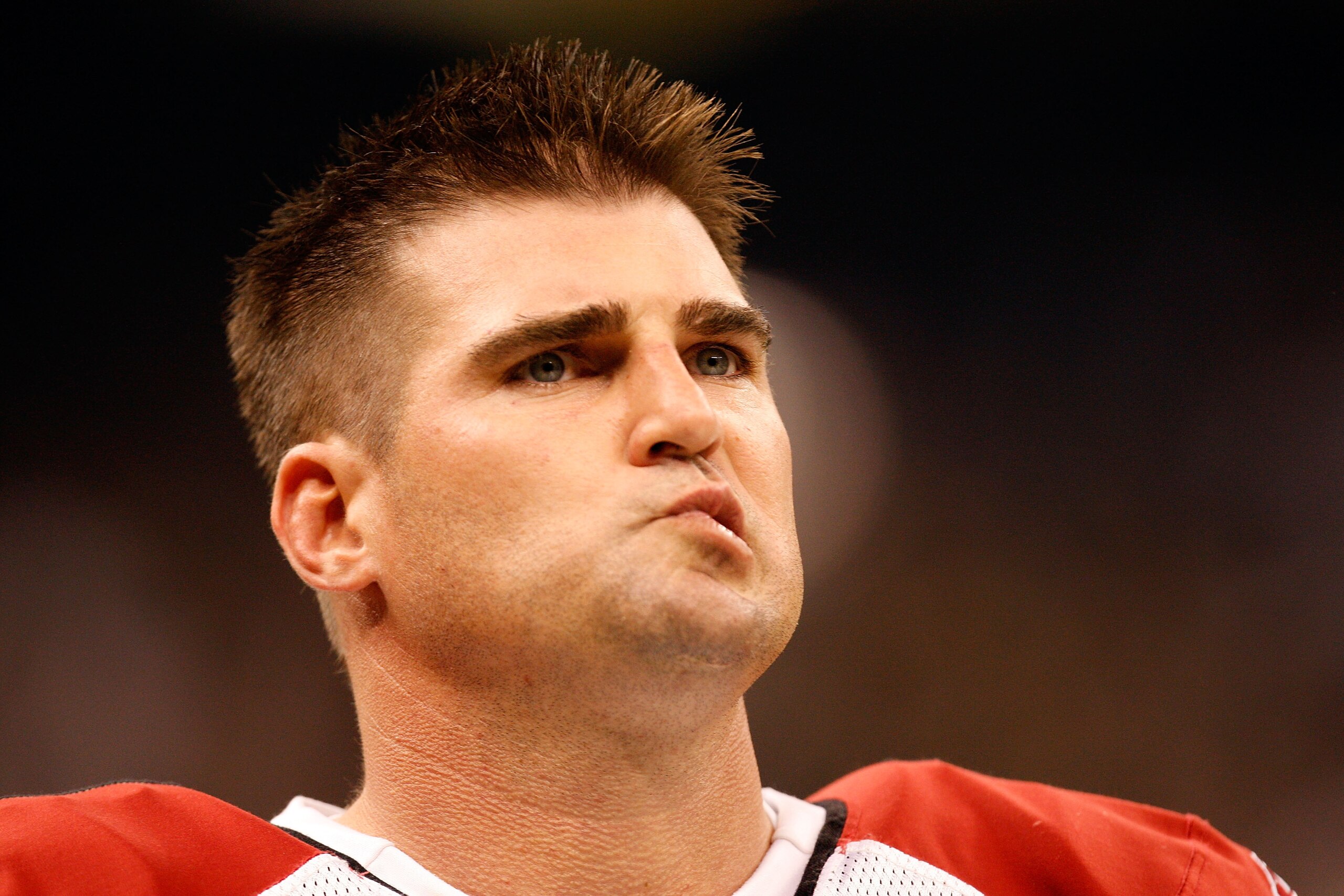 NEW ORLEANS - JANUARY 16:  Neil Rackers #1 of the Arizona Cardinals looks on from the sideline against the New Orleans Saints during the NFC Divisional Playoff Game at Louisana Superdome on January 16, 2010 in New Orleans, Louisiana.  (Photo by Ronald Mar