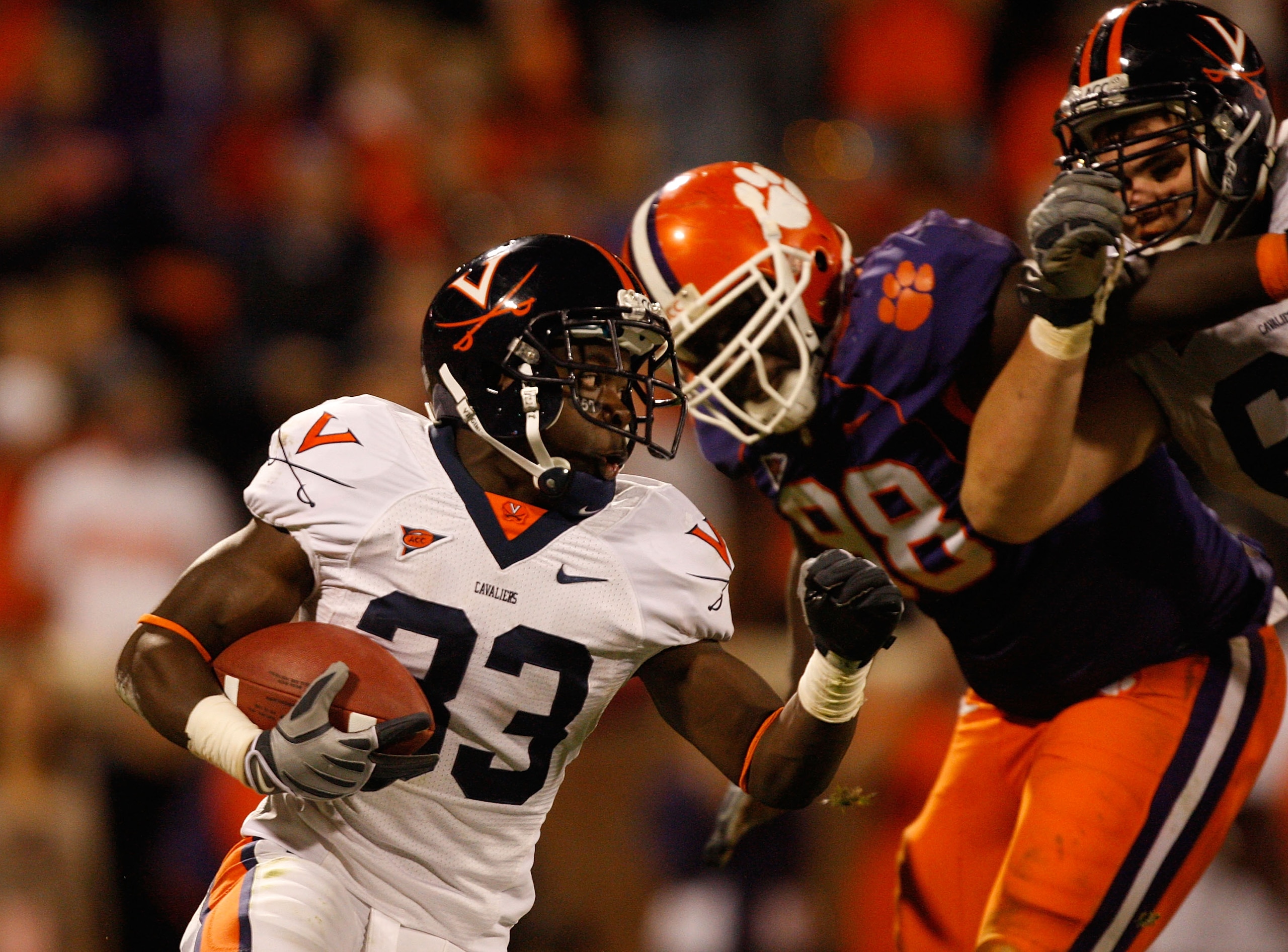 CLEMSON, SC - NOVEMBER 21:  Perry Jones #33 of the Virginia Cavaliers runs with the ball against the Clemson Tigers during their game at Memorial Stadium on November 21, 2009 in Clemson, South Carolina.  (Photo by Streeter Lecka/Getty Images)