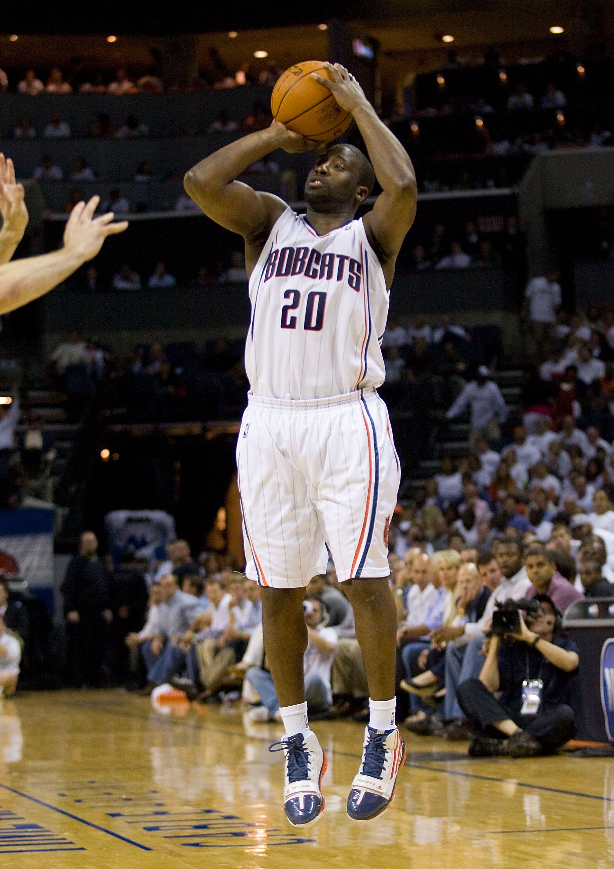 CHARLOTTE, NC - APRIL 26: Raymond Felton #20 of the Charlotte Bobcats attempts a jump shot against the Orlando Magic at Time Warner Cable Arena on April 26, 2010 in Charlotte, North Carolina.  The Magic defeated the Bobcats 99-90 to complete the four game