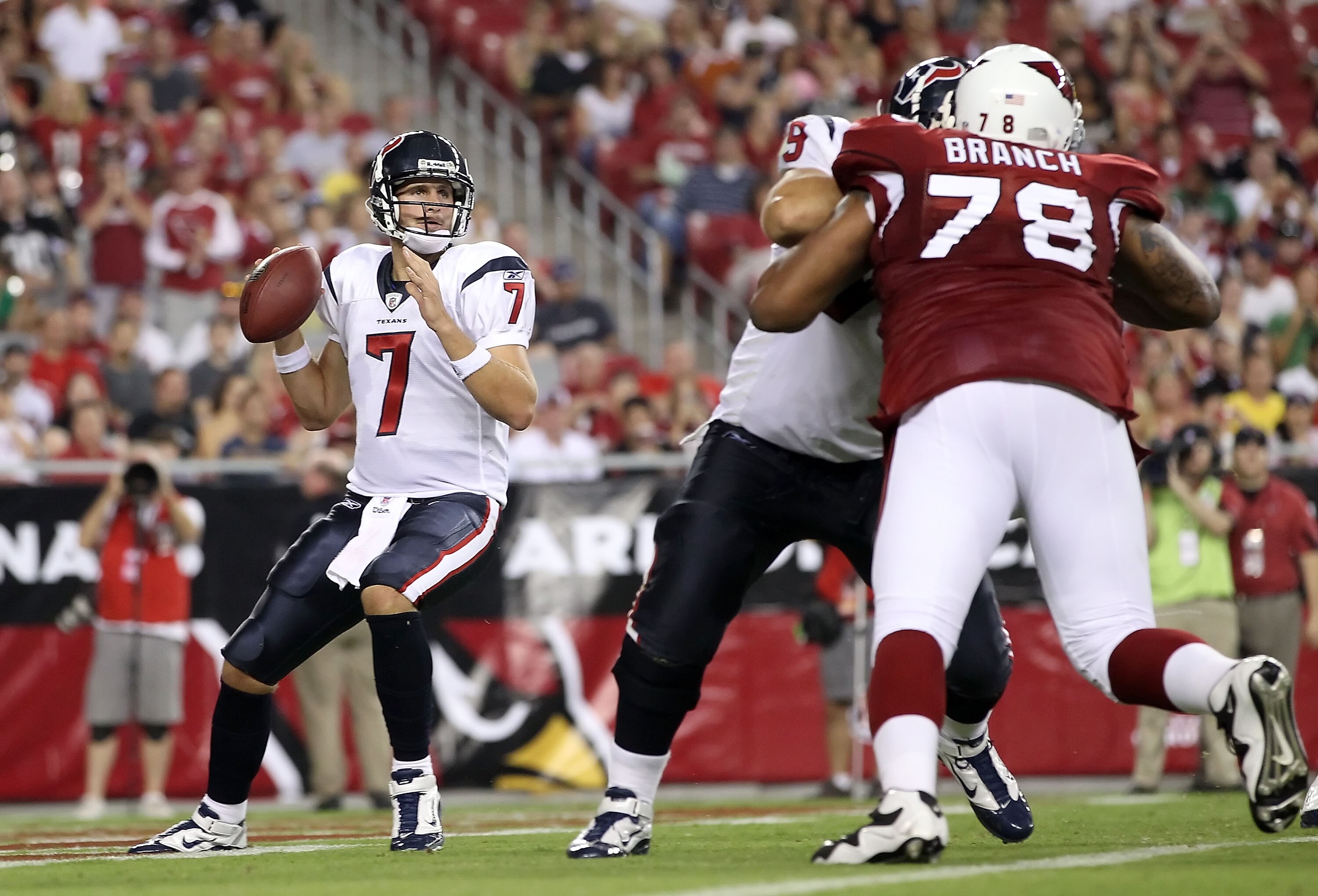 GLENDALE, AZ - AUGUST 14:  Quarterback Dan Orlovsky #7 of the Houston Texans drops back to pass during preseason NFL game against the Arizona Cardinals at the University of Phoenix Stadium on August 14, 2010 in Glendale, Arizona. The Cardinals defeated th