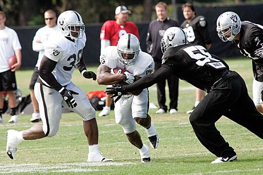 Rolando McClain makes a tackle in camp. Look for the rookie middle linback to make plenty of those during the season.