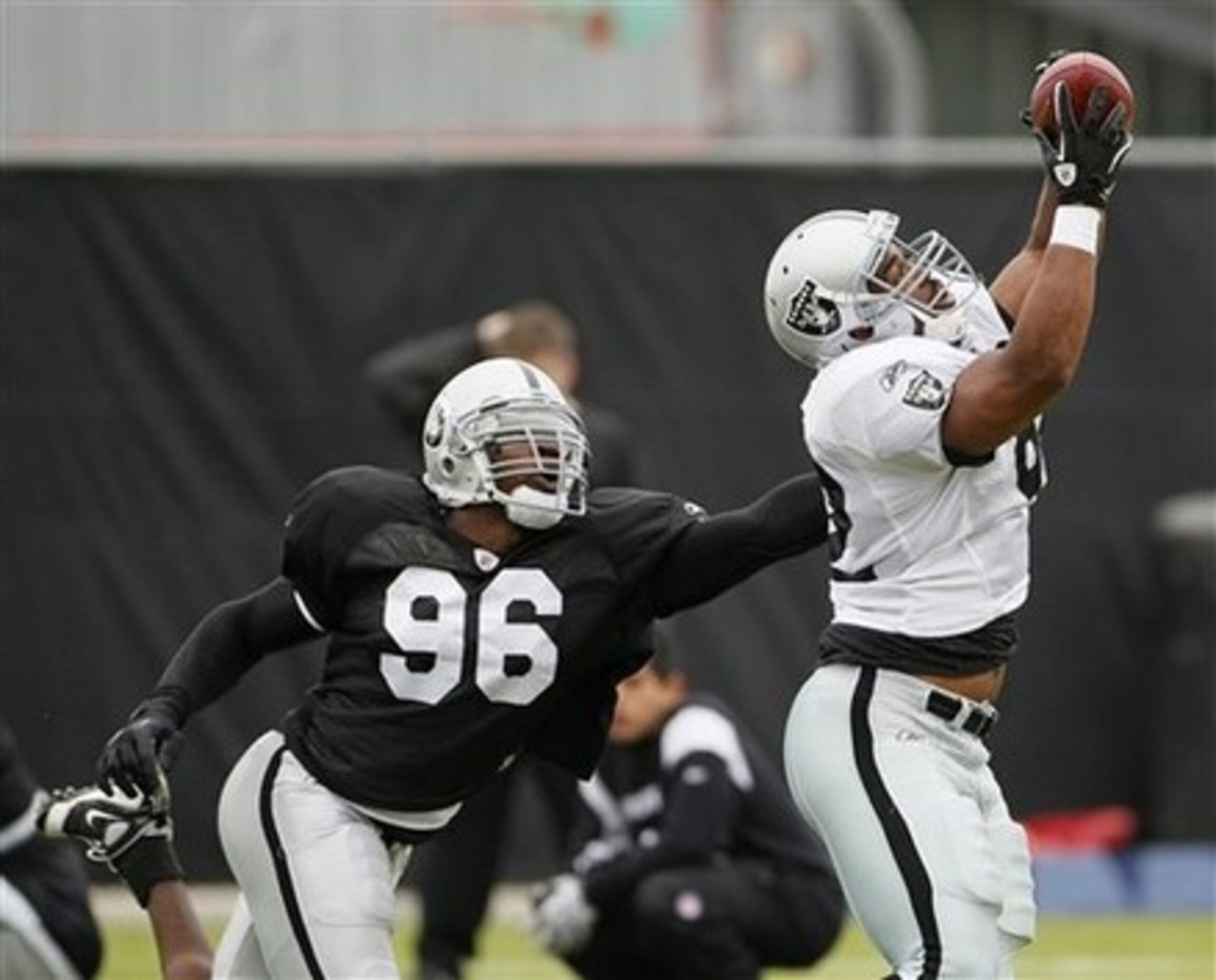 Kamerion Wimbley makes that tackle after the catch.