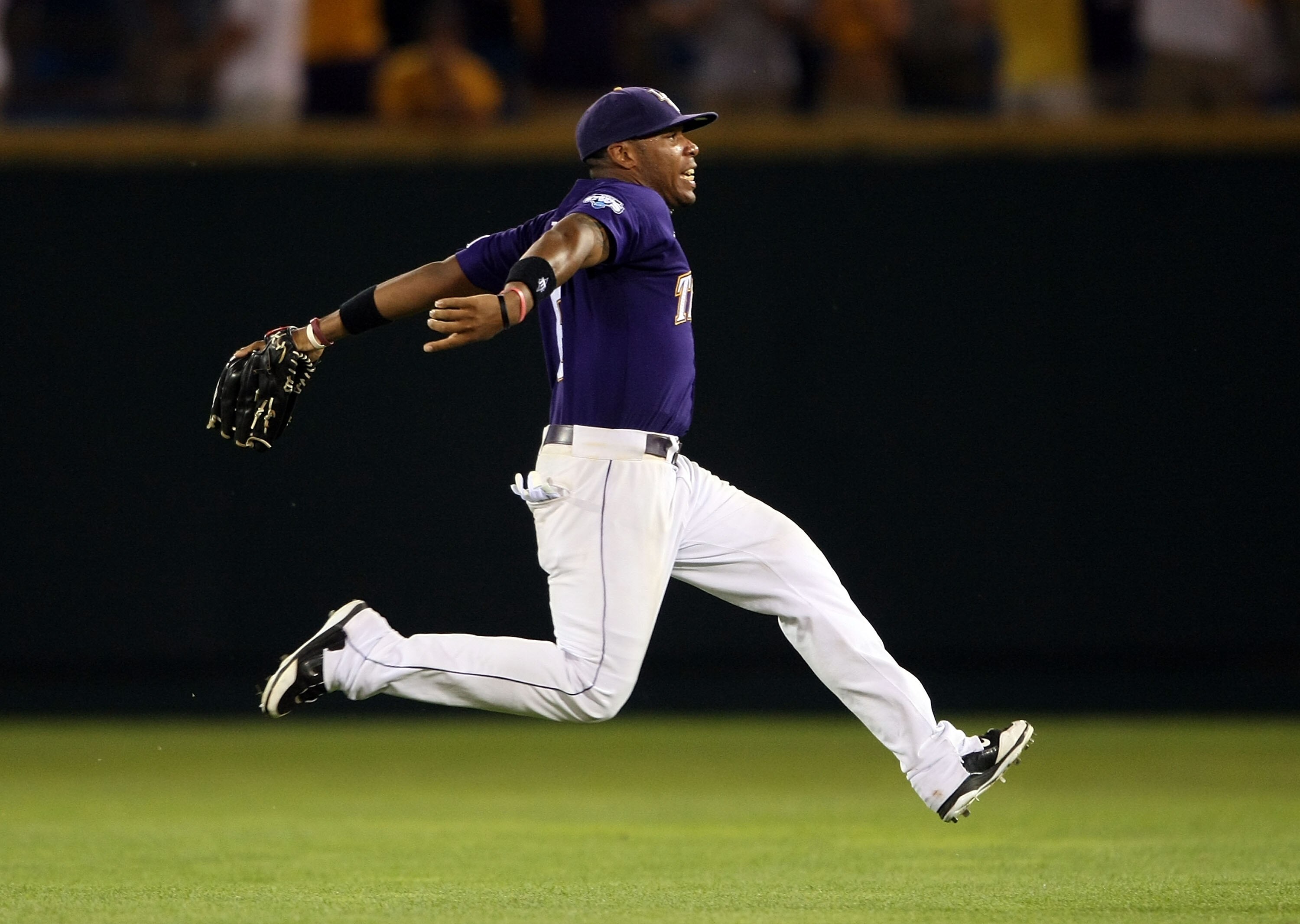 OMAHA, NE - JUNE 22:  Leon Landry #6 of the Louisiana State University Tigers celebrates the win over the Texas Longhorns during Game 1 of the 2009 NCAA College World Series at Rosenblatt Stadium on June 22, 2009 in Omaha, Nebraska. The Tigers defeated th