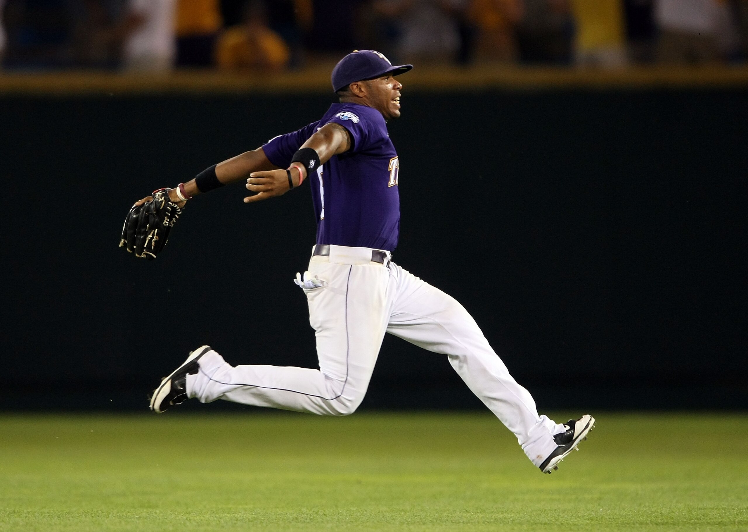 OMAHA, NE - JUNE 22:  Leon Landry #6 of the Louisiana State University Tigers celebrates the win over the Texas Longhorns during Game 1 of the 2009 NCAA College World Series at Rosenblatt Stadium on June 22, 2009 in Omaha, Nebraska. The Tigers defeated th