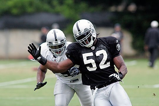 Quentin Groves puts the pas rush move on.