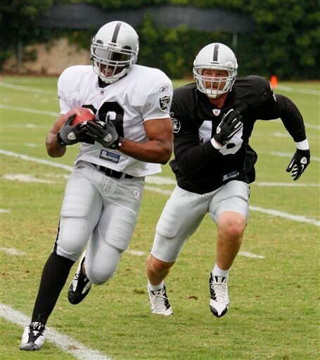 Travis Goethel tries to catch up with Michael Bush.