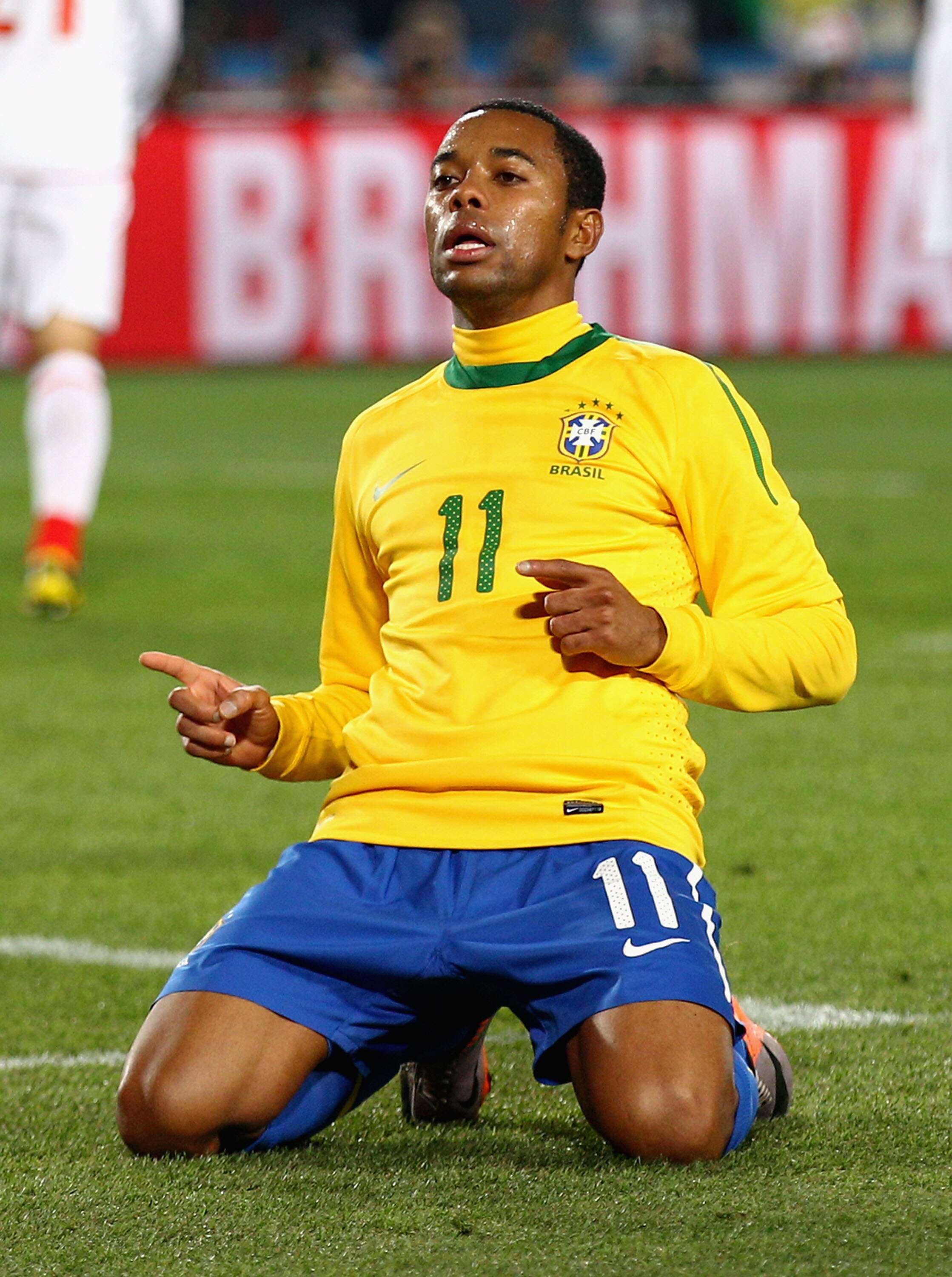 JOHANNESBURG, SOUTH AFRICA - JUNE 28:  Robinho of Brazil celebrates scoring his side's third goal during the 2010 FIFA World Cup South Africa Round of Sixteen match between Brazil and Chile at Ellis Park Stadium on June 28, 2010 in Johannesburg, South Afr
