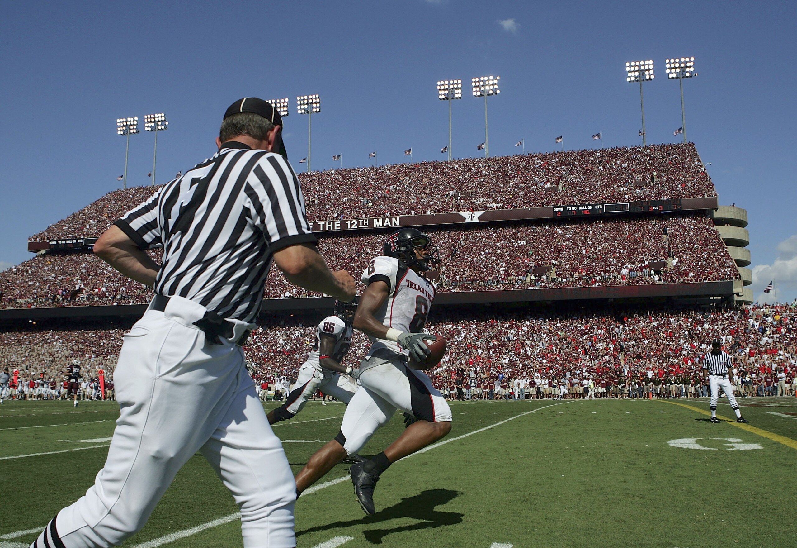COLLEGE STATION, TX -SEPTEMBER 30:  Wide receiver Joel Filani #8 of the Texas Tech Red Raiders runs a 54 yard pass reception for a touchdown against the Texas A&M Aggies at Kyle Field on September 30, 2006 in College Station, Texas.  (Photo by Ronald Mart