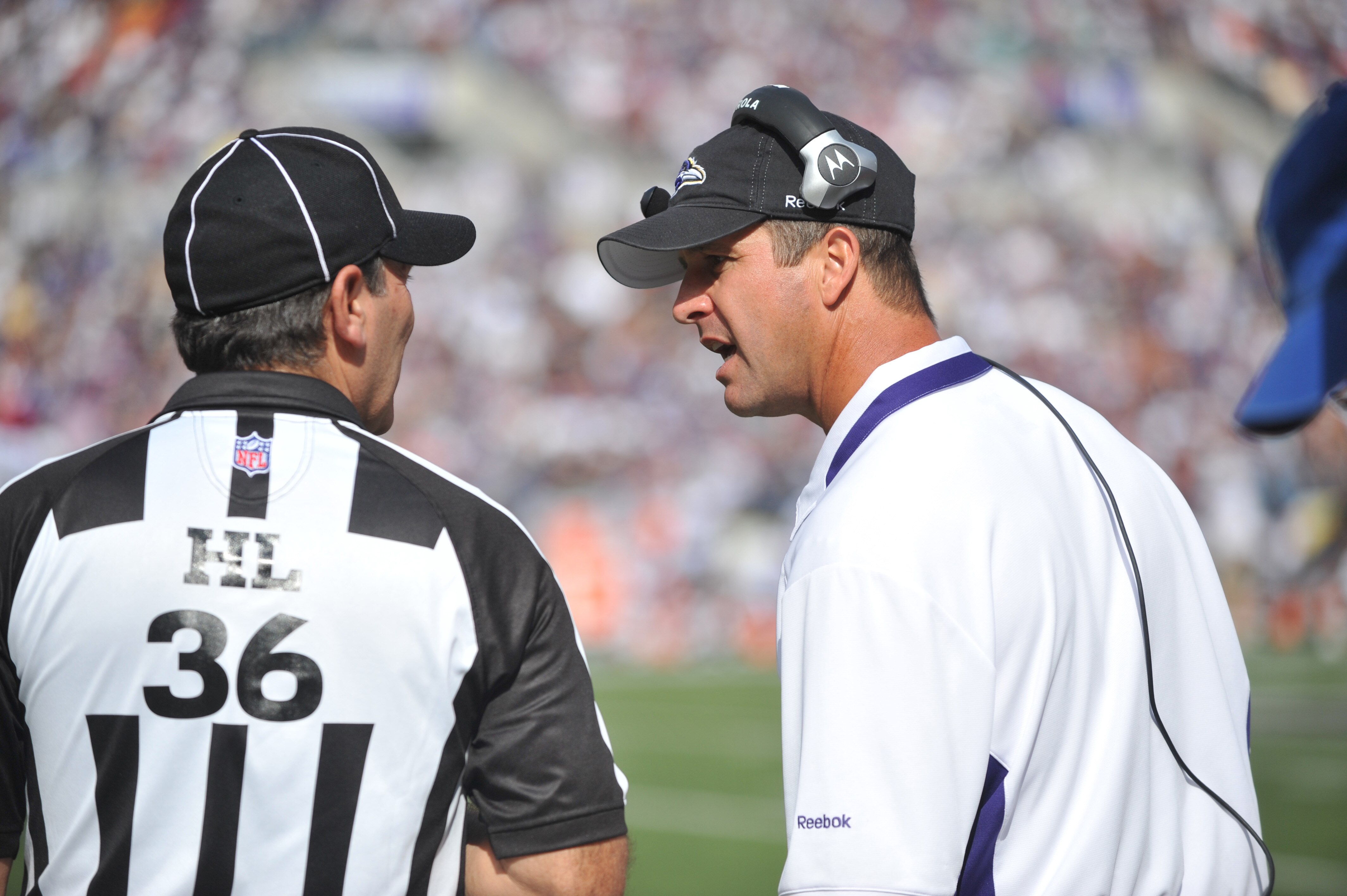 BALTIMORE - SEPTEMBER 27:  Head coach John Harbaugh of the Baltimore Ravens speaks to the referree during the game against the Cleveland Browns at M&T Bank Stadium on September 27, 2009 in Baltimore, Maryland. The Ravens defeated the Browns 34-3. (Photo b