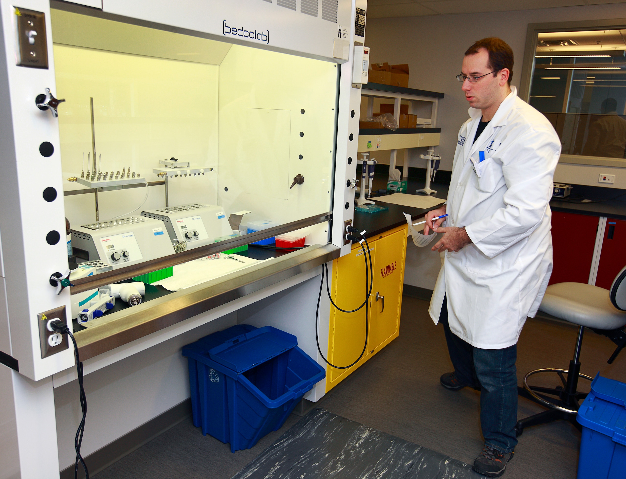 RICMOND, CANADA - OCTOBER 21:  Research analyst Patrick Avon examines a test sample inside the anti-doping lab at the Olympic Oval October 21, 2009 in Richmond, Canada. The lab, which is located inside the Olympic Oval, will test over 2,000 samples during