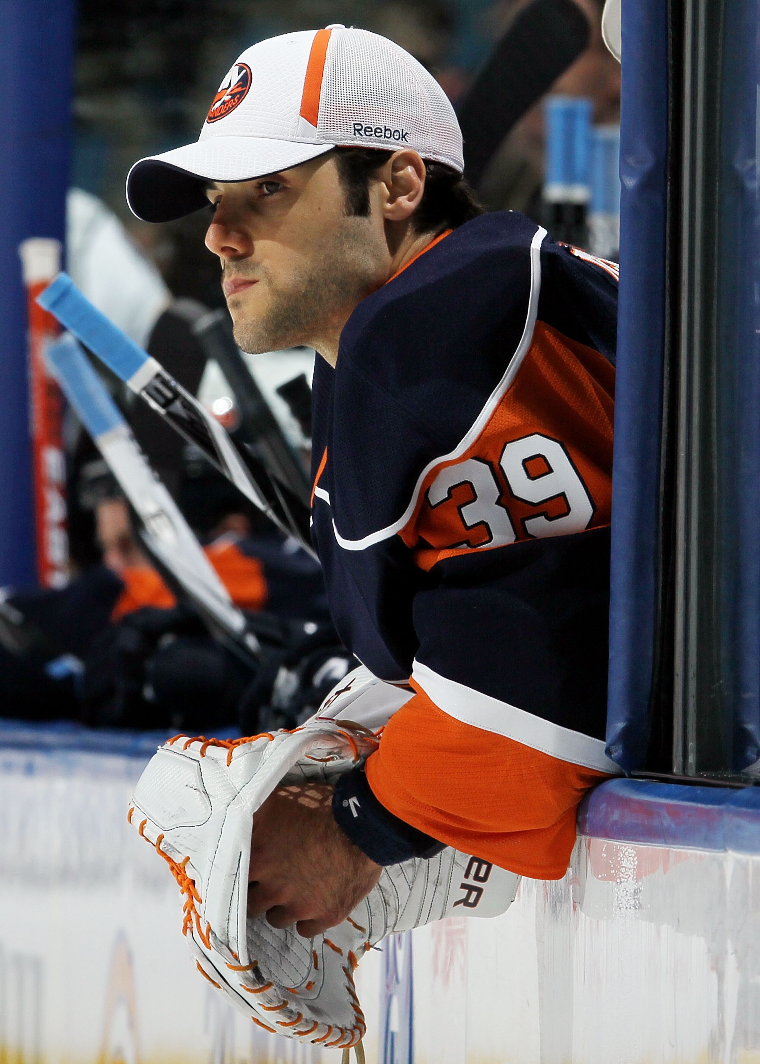 UNIONDALE, NY - FEBRUARY 09:  Rick DiPietro #39 of the New York Islanders looks on from the bench as his team plays against the Nashville Predators on February 9, 2010 at Nassau Coliseum in Uniondale, New York. The Islanders defeated the Predators 4-3 aft