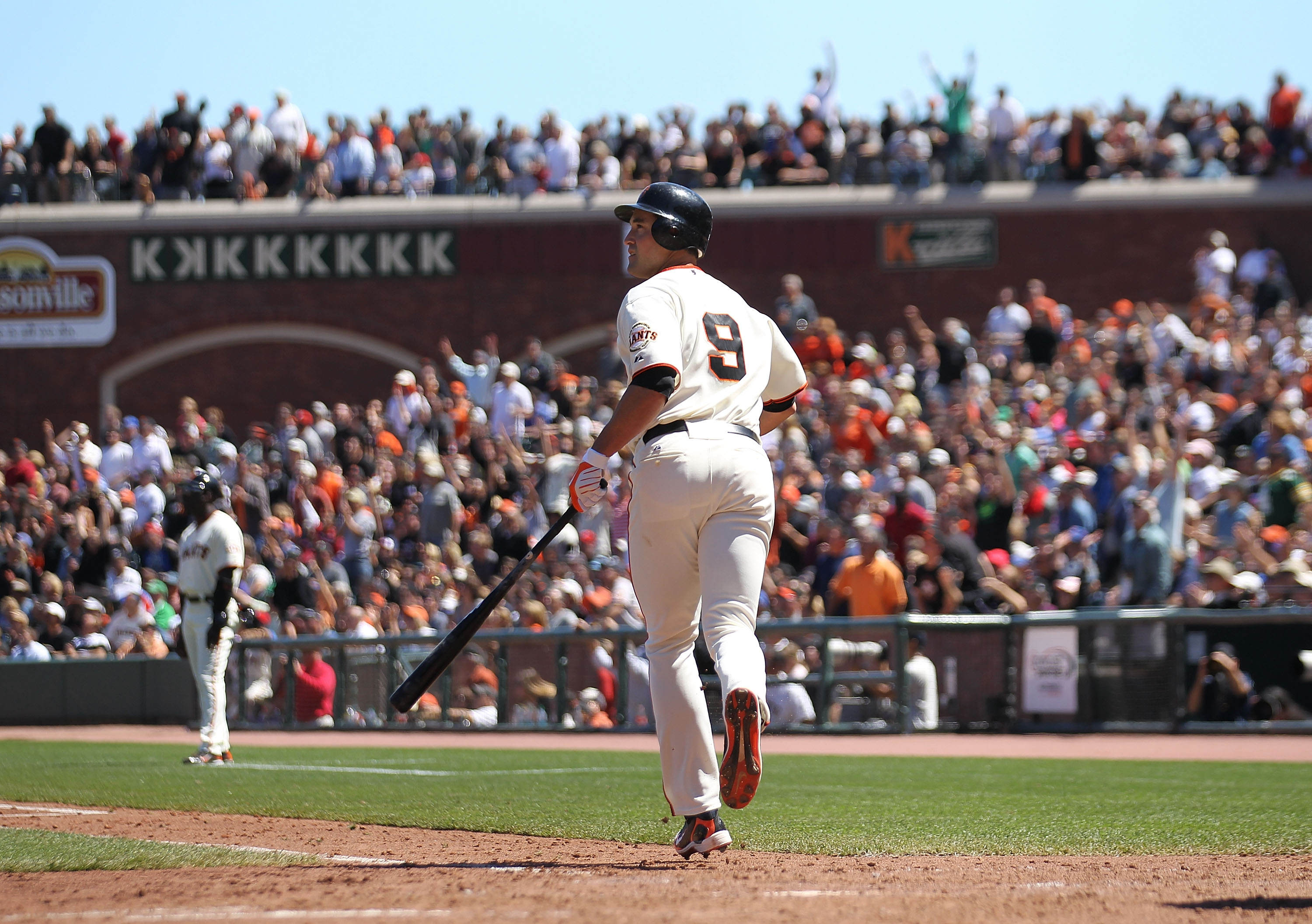 SAN FRANCISCO - AUGUST 12:  Pat Burrell #9 of the San Francisco Giants hits a grand slam against the Chicago Cubs in the fifth inning during an MLB game at AT&T Park on August 12, 2010 in San Francisco, California.  (Photo by Jed Jacobsohn/Getty Images)