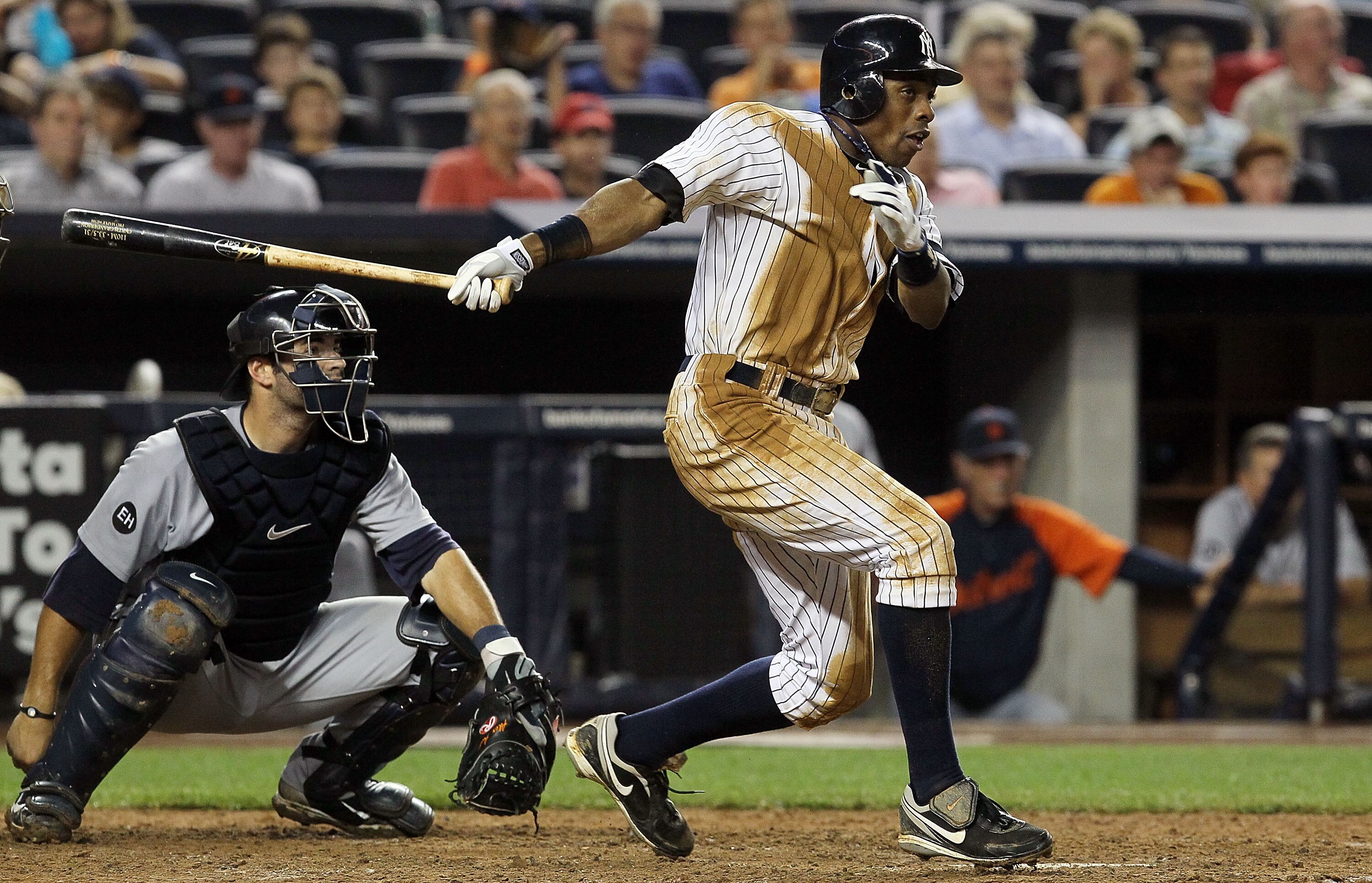 NEW YORK - AUGUST 16:  Curtis Granderson #14 of the New York Yankees follows through on a seventh inning double against the Detroit Tigers on August 16, 2010 at Yankee Stadium in the Bronx borough of New York City.  (Photo by Jim McIsaac/Getty Images)