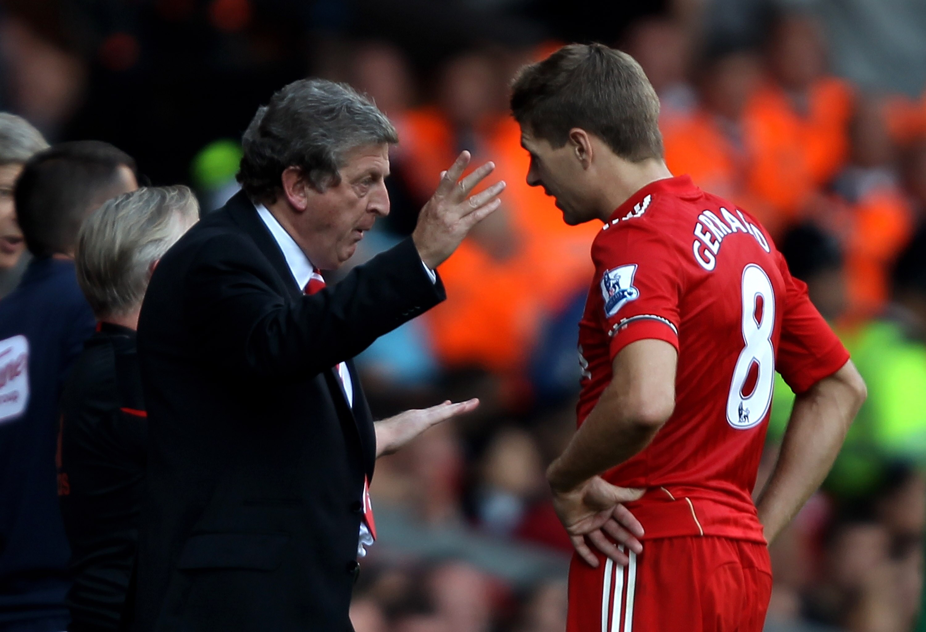 LIVERPOOL, ENGLAND - AUGUST 15:  Liverpool Manager Roy Hodgson issues instructions to Steven Gerrard during the Barclays Premier League match between Liverpool and Arsenal at Anfield on August 15, 2010 in Liverpool, England.  (Photo by Clive Brunskill/Get