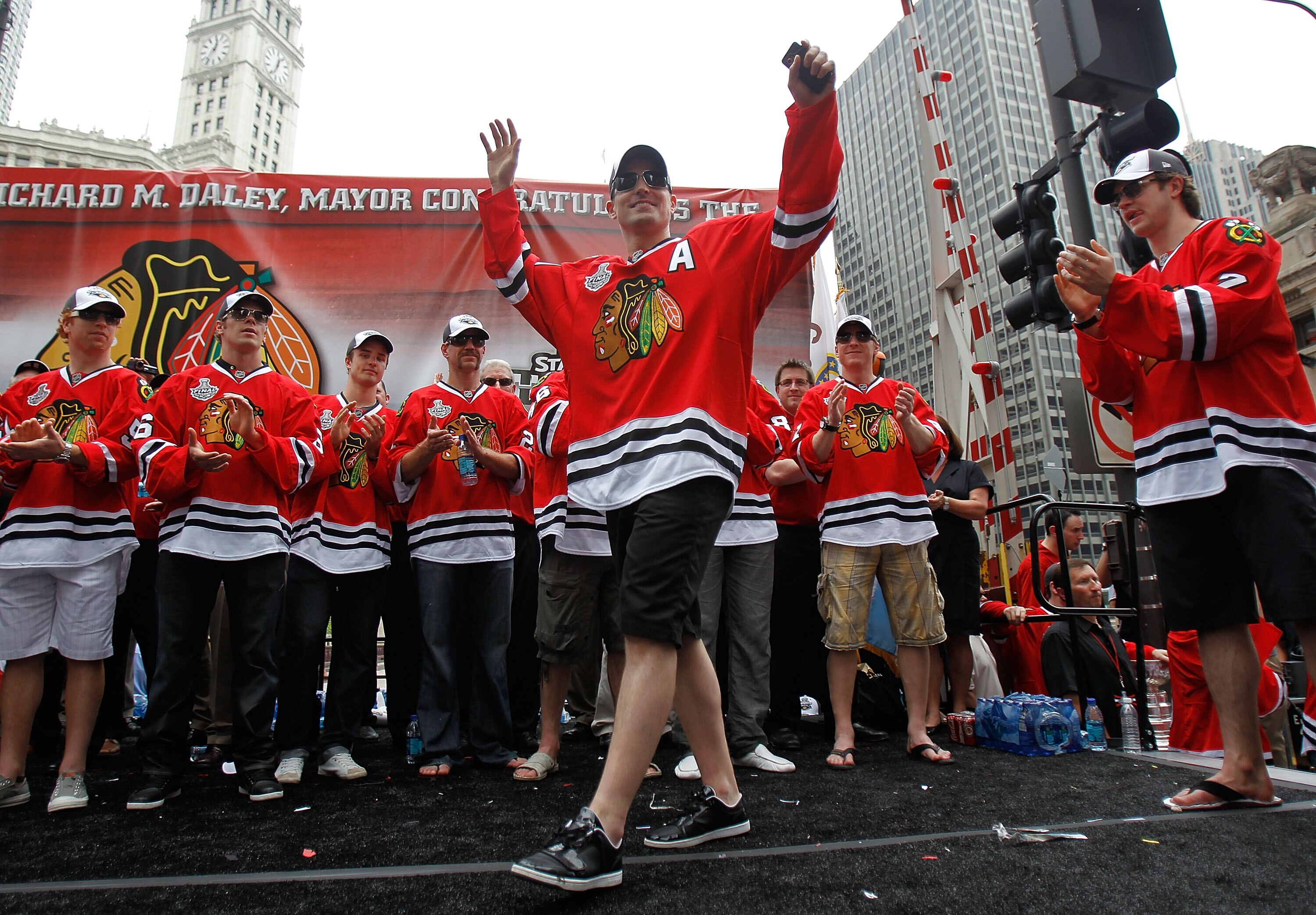 CHICAGO - JUNE 11: Patrick Sharp #10 waves the crowd during the Chicago Blackhawks Stanley Cup victory parade and rally on June 11, 2010 in Chicago, Illinois. (Photo by Jonathan Daniel/Getty Images)