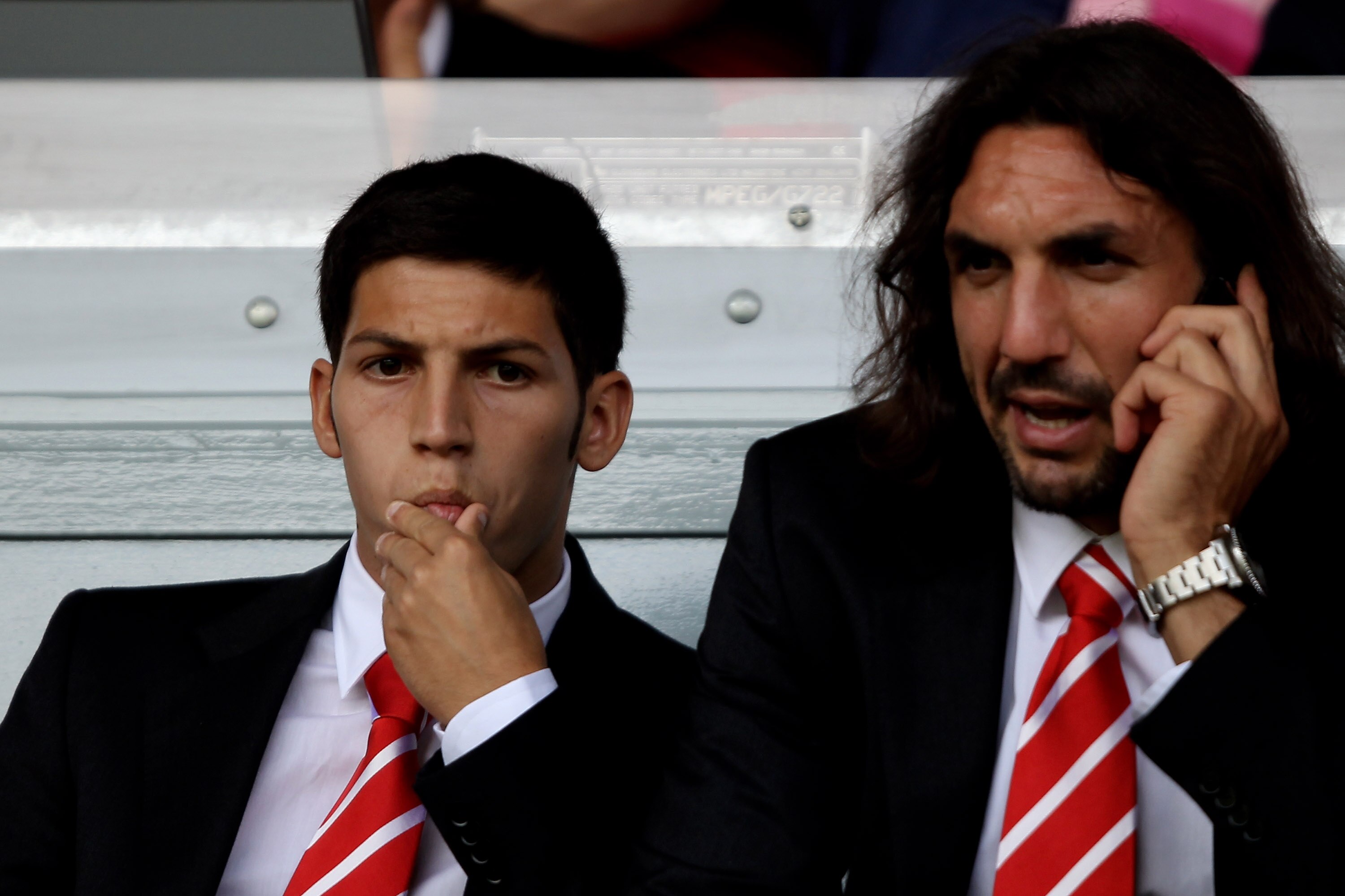 LIVERPOOL, ENGLAND - AUGUST 15:  Dani Pacheco (L) of Liverpool looks on during the Barclays Premier League match between Liverpool and Arsenal at Anfield on August 15, 2010 in Liverpool, England. (Photo by Clive Brunskill/Getty Images)