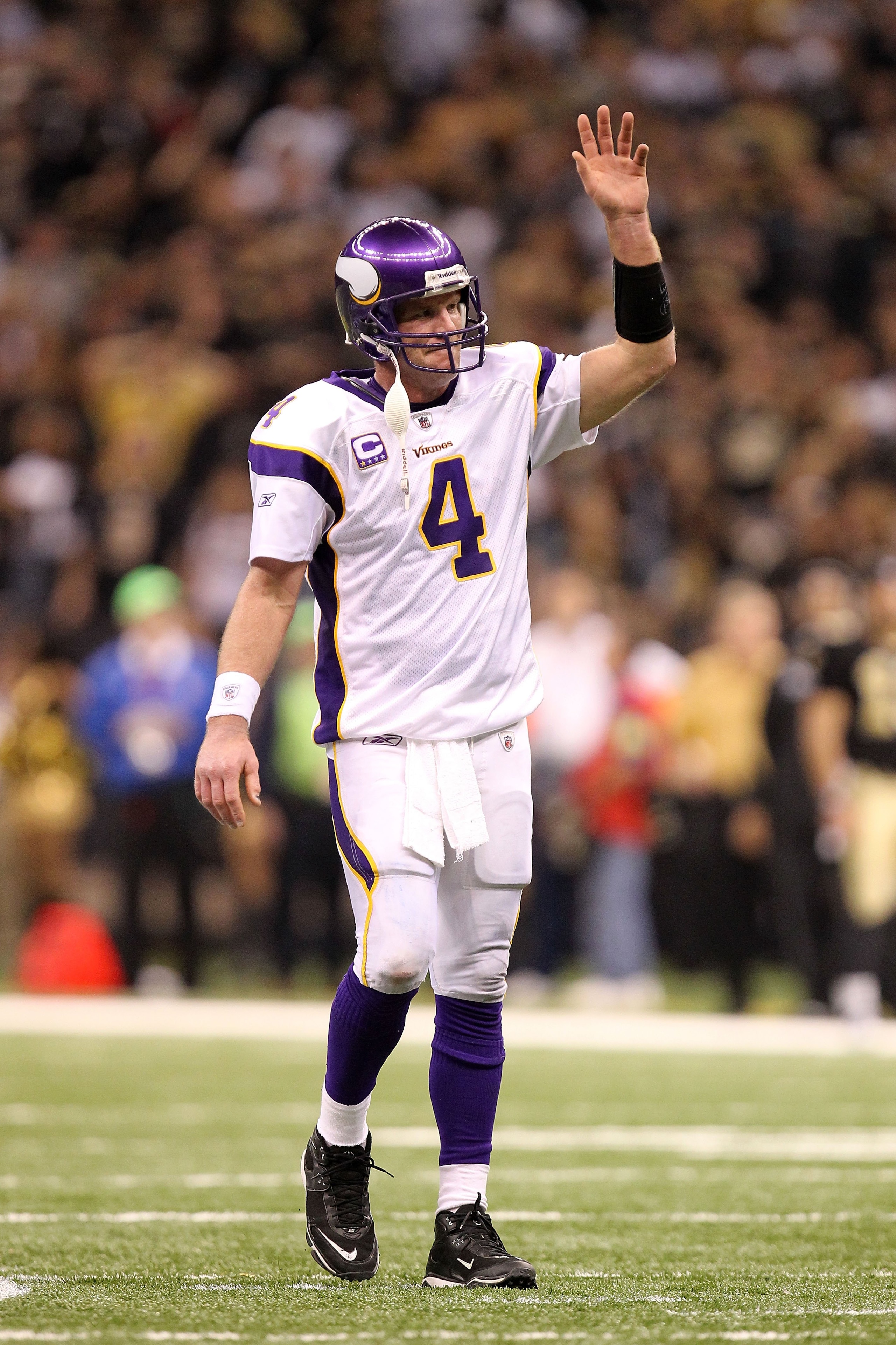 NEW ORLEANS - JANUARY 24:  Quarterback Brett Favre #4 of the Minnesota Vikings waves on the field against the New Orleans Saints during the NFC Championship Game at the Louisiana Superdome on January 24, 2010 in New Orleans, Louisiana. The Saints won 31-2