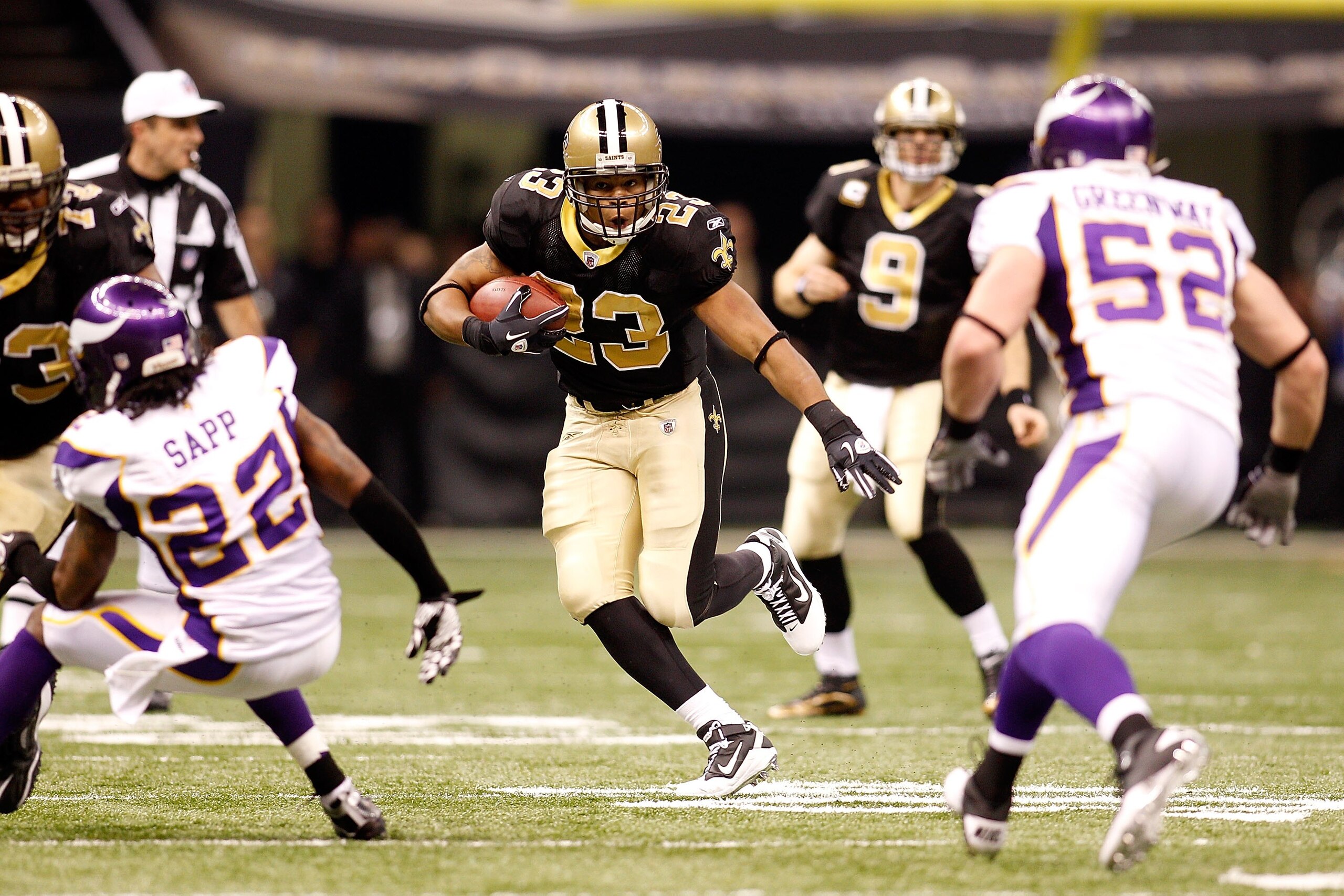 NEW ORLEANS - JANUARY 24:  Pierre Thomas #23 of the New Orleans Saints runs the ball against the Minnesota Vikings during the NFC Championship Game at the Louisiana Superdome on January 24, 2010 in New Orleans, Louisiana. The Saints won 31-28 in overtime.