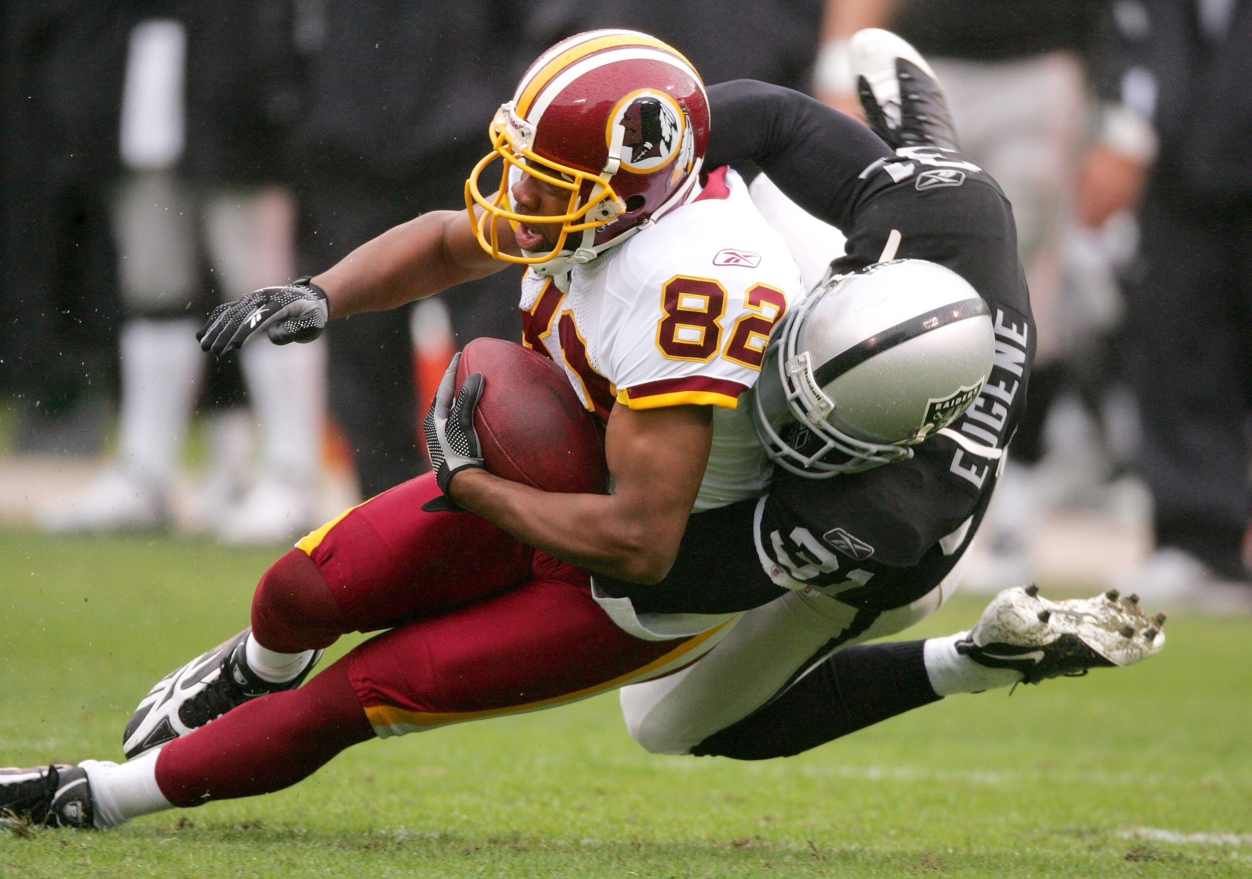 OAKLAND, CA - DECEMBER 13: Antwaan Randle El #82 of the Washington Redskins is tackled by Hiram Eugene #31 of the Oakland Raiders at Oakland-Alameda County Coliseum on December 13, 2009 in Oakland, California. (Photo by Ezra Shaw/Getty Images) OAKLAND, CA - DECEMBER 13: Antwaan Randle El #82 of the Washington Redskins is tackled by Hiram Eugene #31 of the Oakland Raiders at Oakland-Alameda County Coliseum on December 13, 2009 in Oakland, California. (Photo by Ezra Shaw/Getty Images)