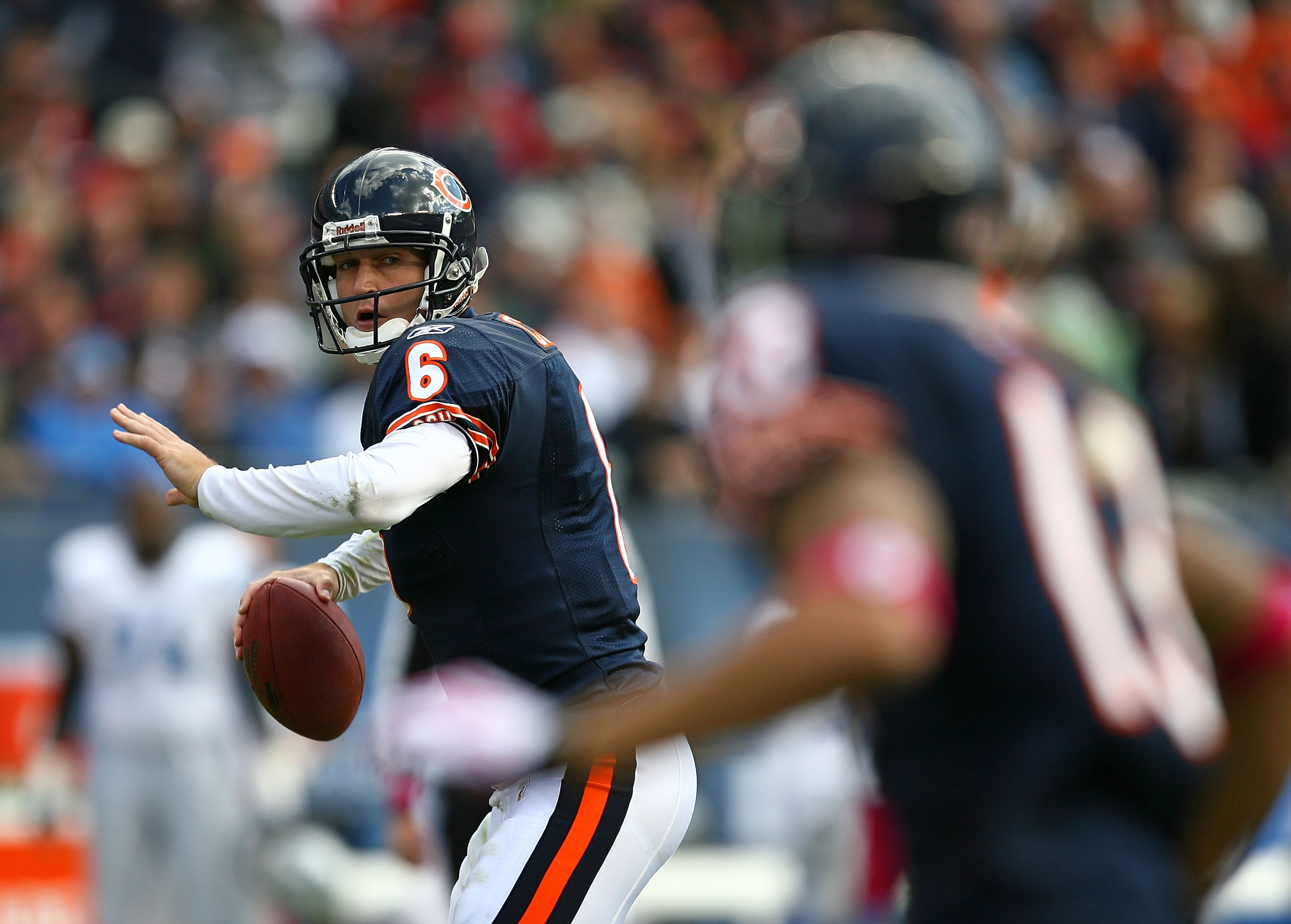 CHICAGO - OCTOBER 04: Jay Cutler #6 of the Chicago Bears prepares to throw the ball to teammate Johnny Knox #13 against the Detroit Lions on October 4, 2009 at Soldier Field in Chicago, Illinois. The Bears defeated the Lions 48-24. (Photo by Jonathan Dani