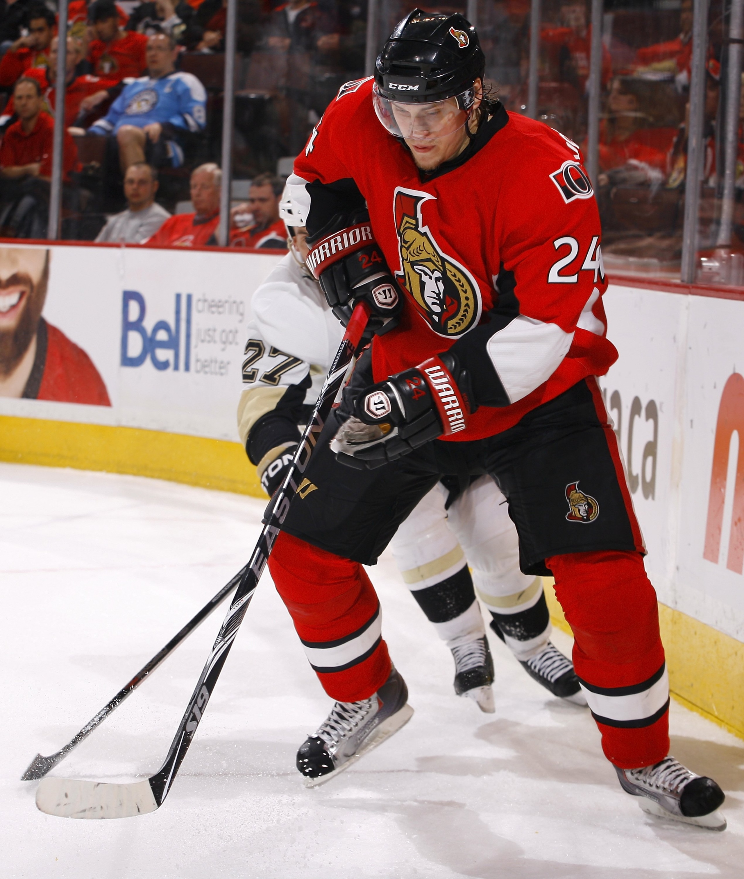 OTTAWA, ON - APRIL 20:  Anton Volchenkov #24 of the Ottawa Senators plays the puck against the Pittsburgh Penguins in Game 4 of the Eastern Conference Quaterfinals during the 2010 Stanley Cup Playoffs at Scotiabank Place on April 20, 2010 in Ottawa, Canad