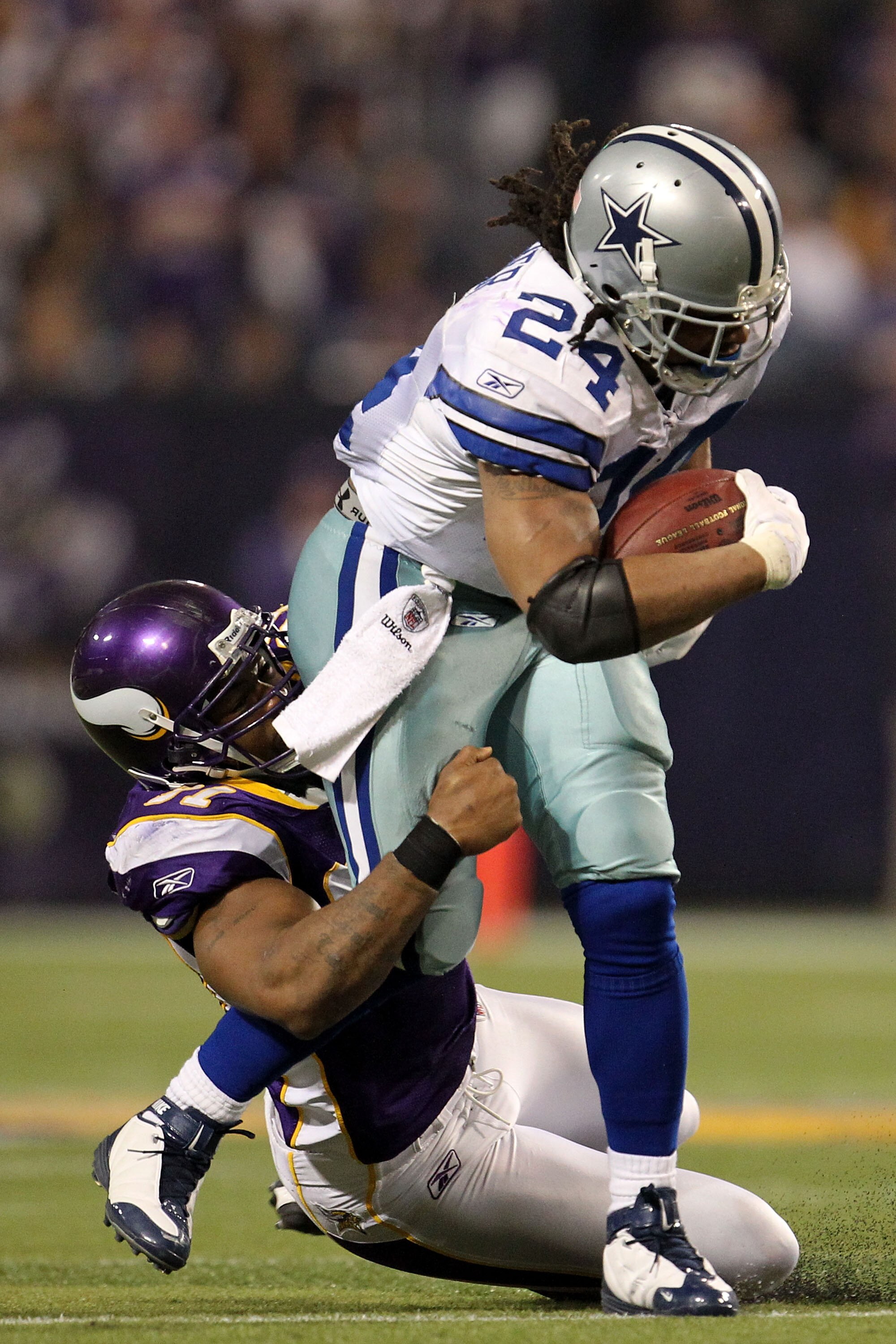 MINNEAPOLIS - JANUARY 17:  Defensive end Ray Edwards #91 of the Minnesota Vikings tackles Marion Barber #24 of the Dallas Cowboys during the third quarter of the NFC Divisional Playoff Game at Hubert H. Humphrey Metrodome on January 17, 2010 in Minneapoli
