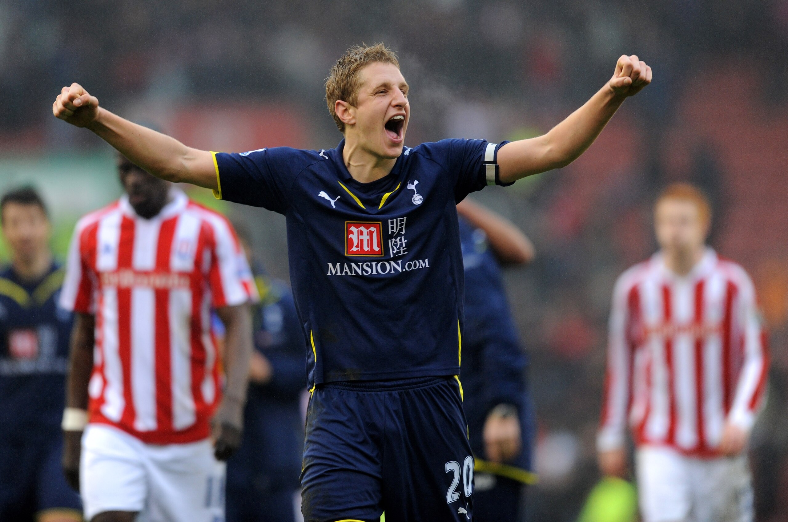 STOKE ON TRENT, ENGLAND - MARCH 20: Michael Dawson of Tottenham celebrates after the Barclays Premier League match between Stoke City and Tottenham Hotspur at the Britannia Stadium on March 20, 2010 in Stoke on Trent, England.  (Photo by Michael Regan/Get