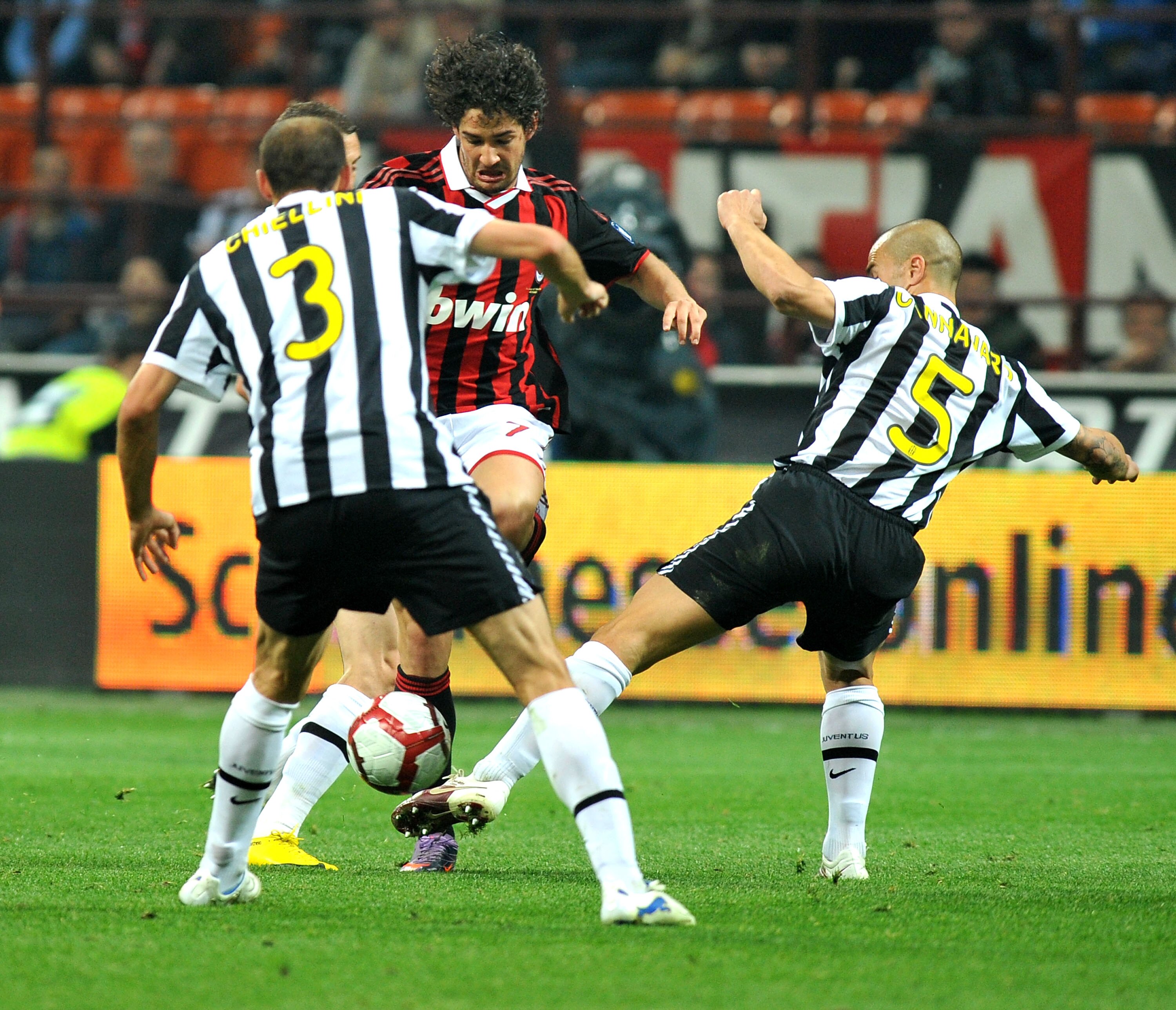 MILAN, ITALY - MAY 15: Alexandre Pato of AC Milan battles for the ball against Giorgio Chiellini and Fabio Cannavaro of Juventus FC during the Serie A match between AC Milan and Juventus FC at Stadio Giuseppe Meazza on May 15, 2010 in Milan, Italy.  (Phot