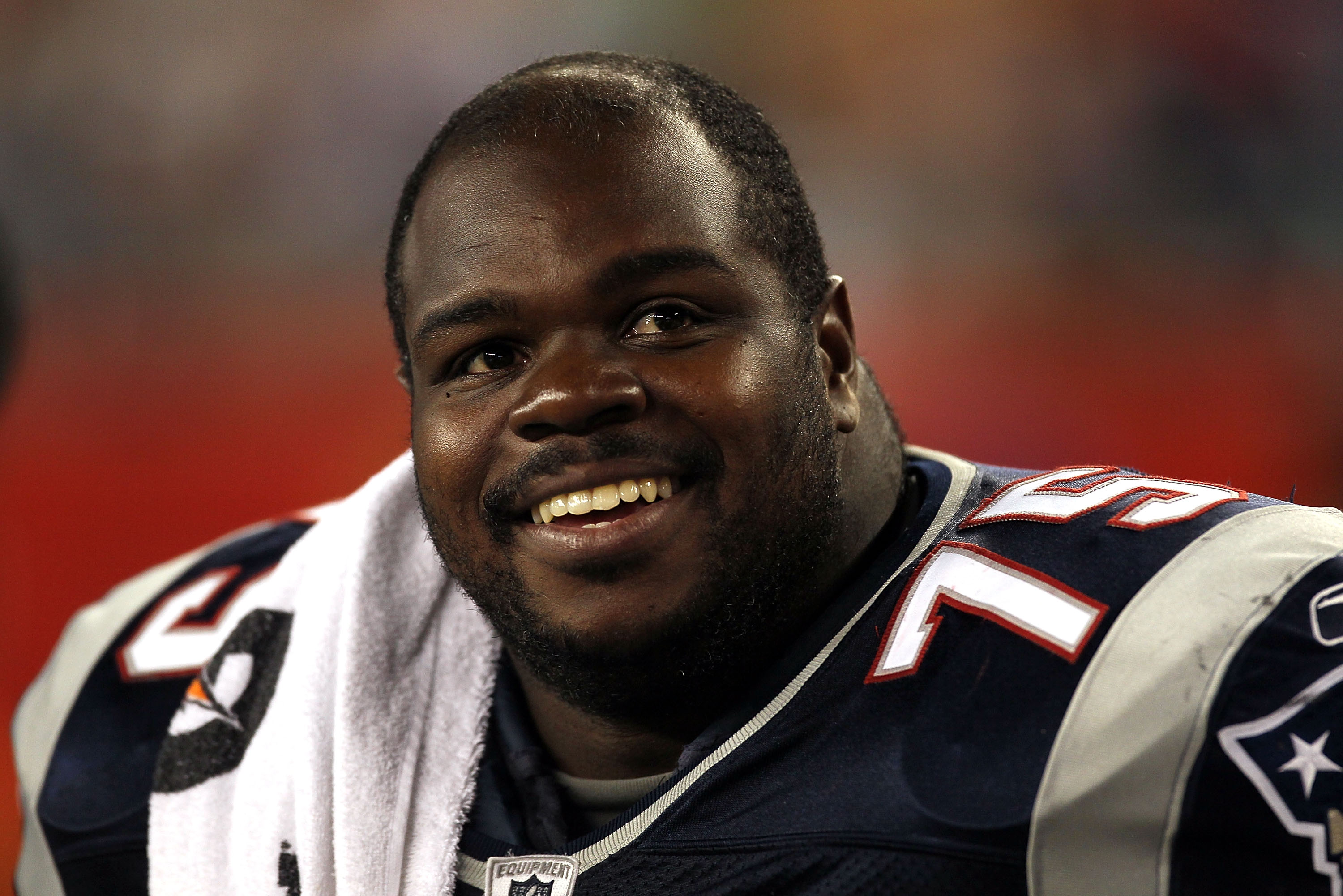 FOXBORO, MA - AUGUST 12: Vince Wilfork # 75 of the New England Patriots watches the action from the sidelines during the preseason game against the New Orleans Saints at Gillette Stadium on August 12, 2010 in Foxboro, Massachusetts. (Photo by Jim Rogash/G