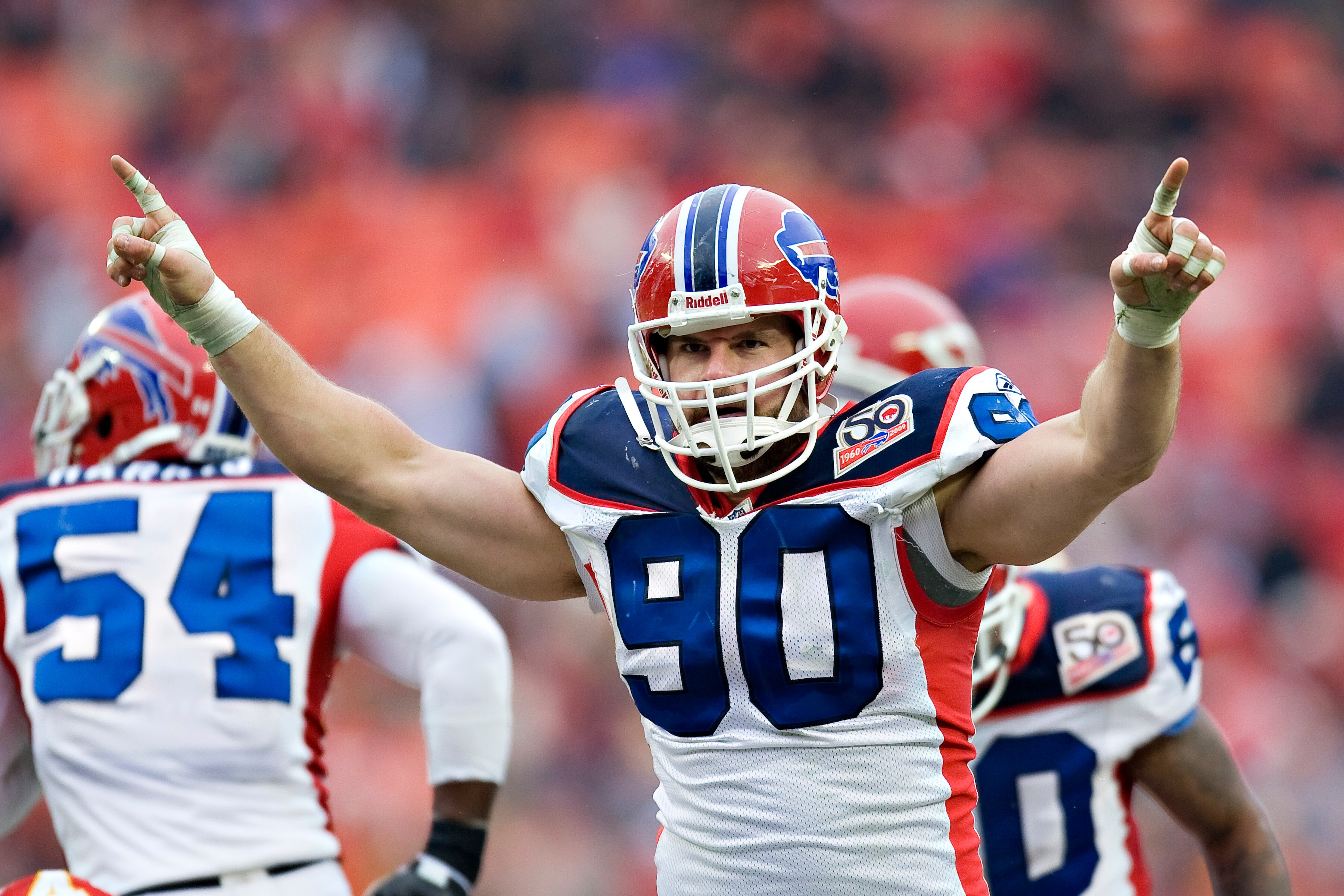 KANSAS CITY, MO - DECEMBER 13: Defensive end Chris Kelsay #90 of the Buffalo Bills signals to the crowd after the sacking the quarterback during NFL action against the Kansas City Chiefs at Arrowhead Stadium on December 13, 2009 Kansas City, Missouri.  Th