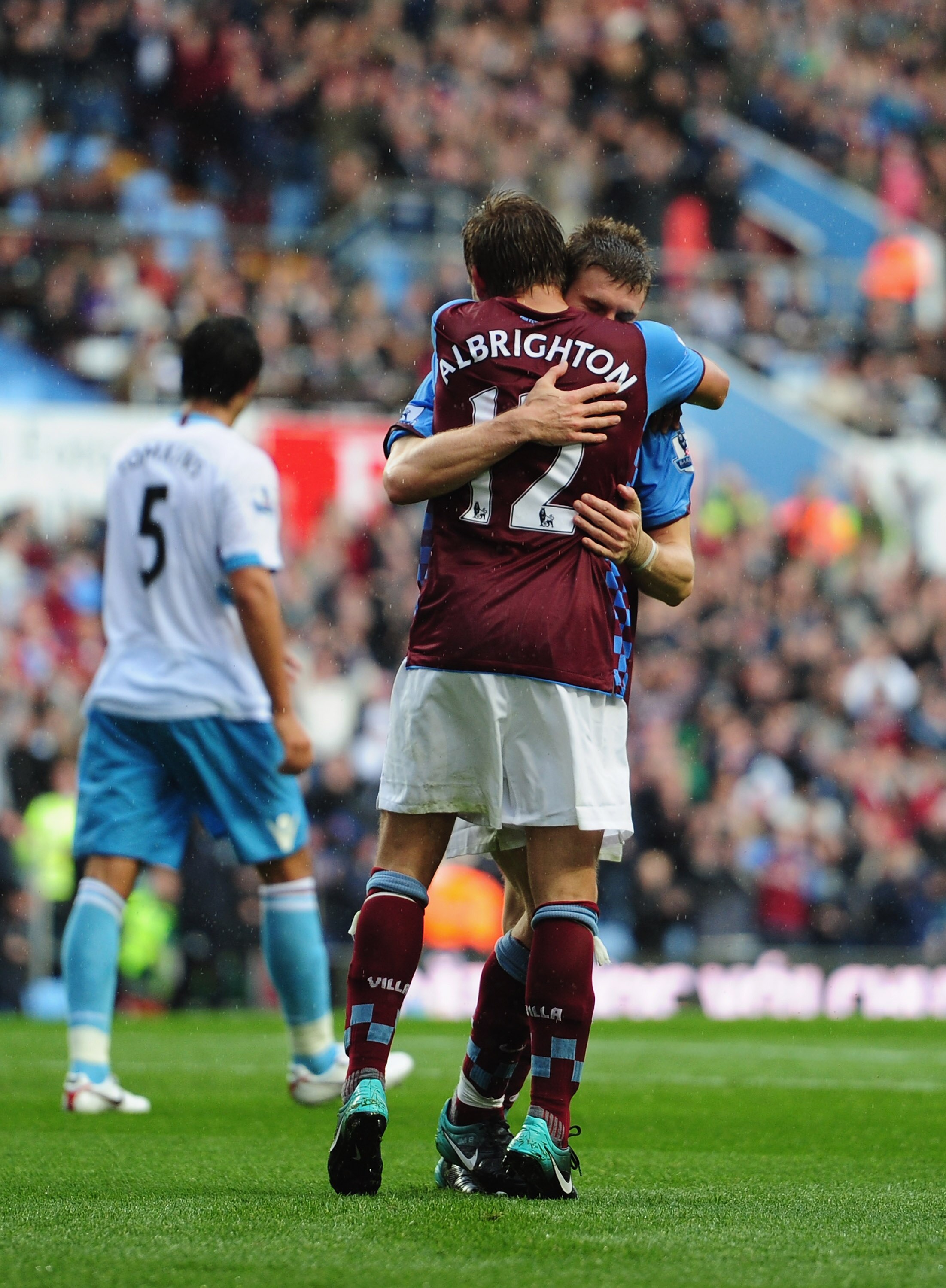 BIRMINGHAM, ENGLAND - AUGUST 14:  James Milner of Aston Villa celebrates his goal with Marc Albrighton during the Barclays Premier League match between Aston Villa and West Ham United at Villa Park on August 14, 2010 in Birmingham, England.  (Photo by Jam