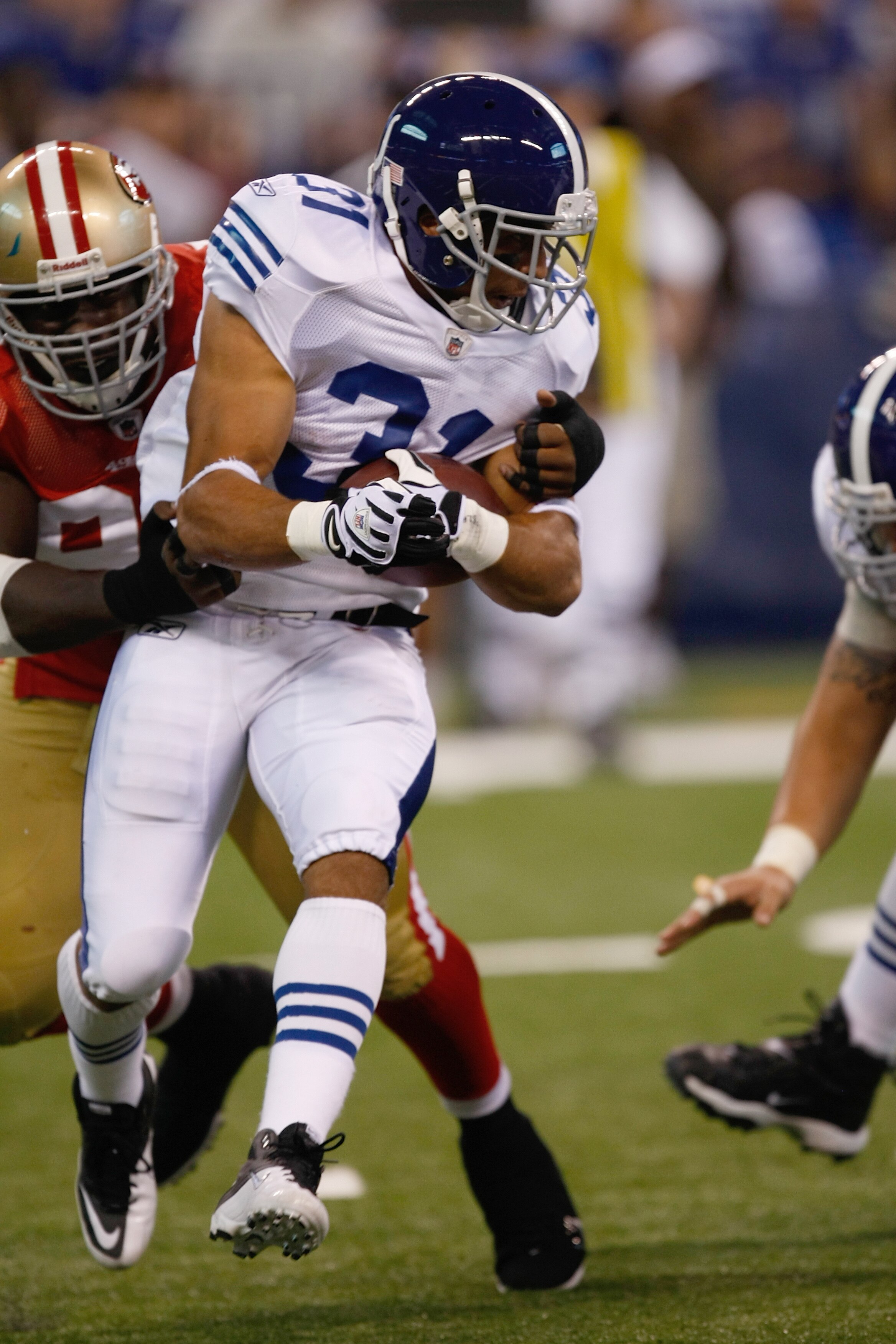 INDIANAPOLIS, IN - AUGUST 15: Donald Brown #31 of the Indianapolis Colts runs during the preseason game against the San Francisco 49ers at Lucas Oil Stadium on August 15, 2010 in Indianapolis, Indiana.  (Photo by Scott Boehm/Getty Images)