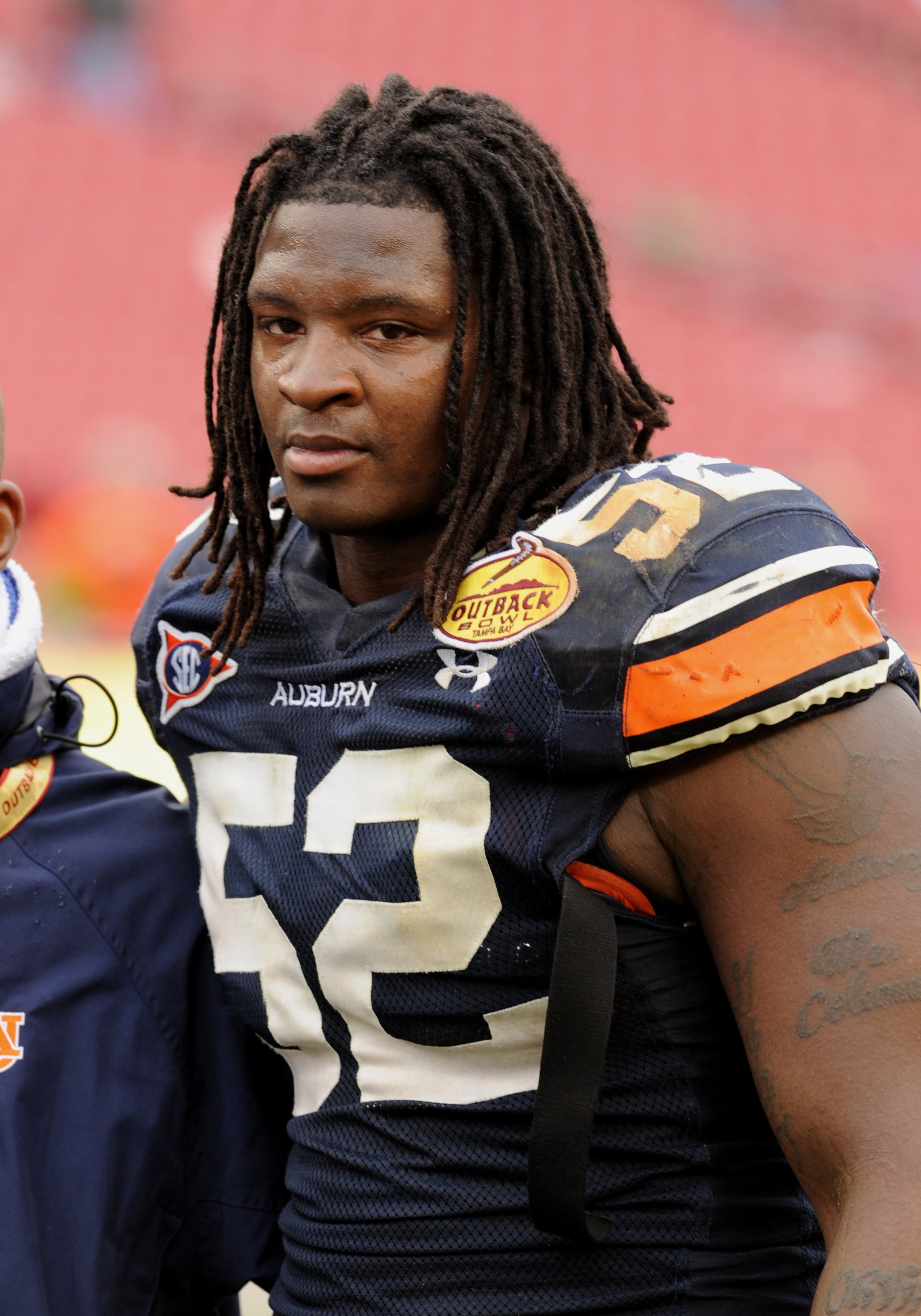 TAMPA, FL - JANUARY 1: Defensive end Antonio Coleman #52 of the Auburn Tigers leaves the field after play against the Northwestern Wildcats in the Outback Bowl January 1, 2010 at Raymond James Stadium in Tampa, Florida.  (Photo by Al Messerschmidt/Getty I